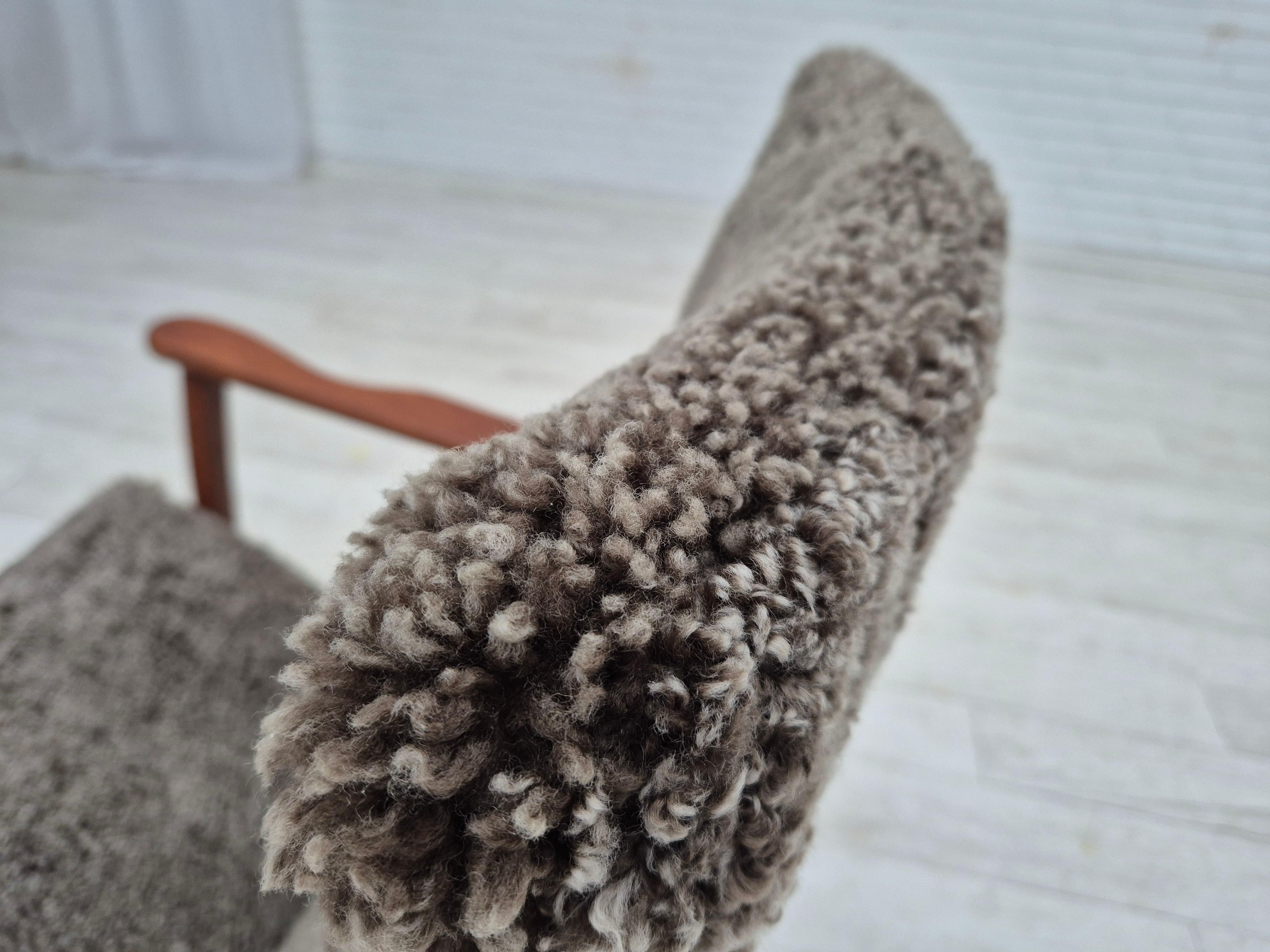 1960s, Scandinavian rocking chair, reupholstered in quality genuine sheepskin. 10
