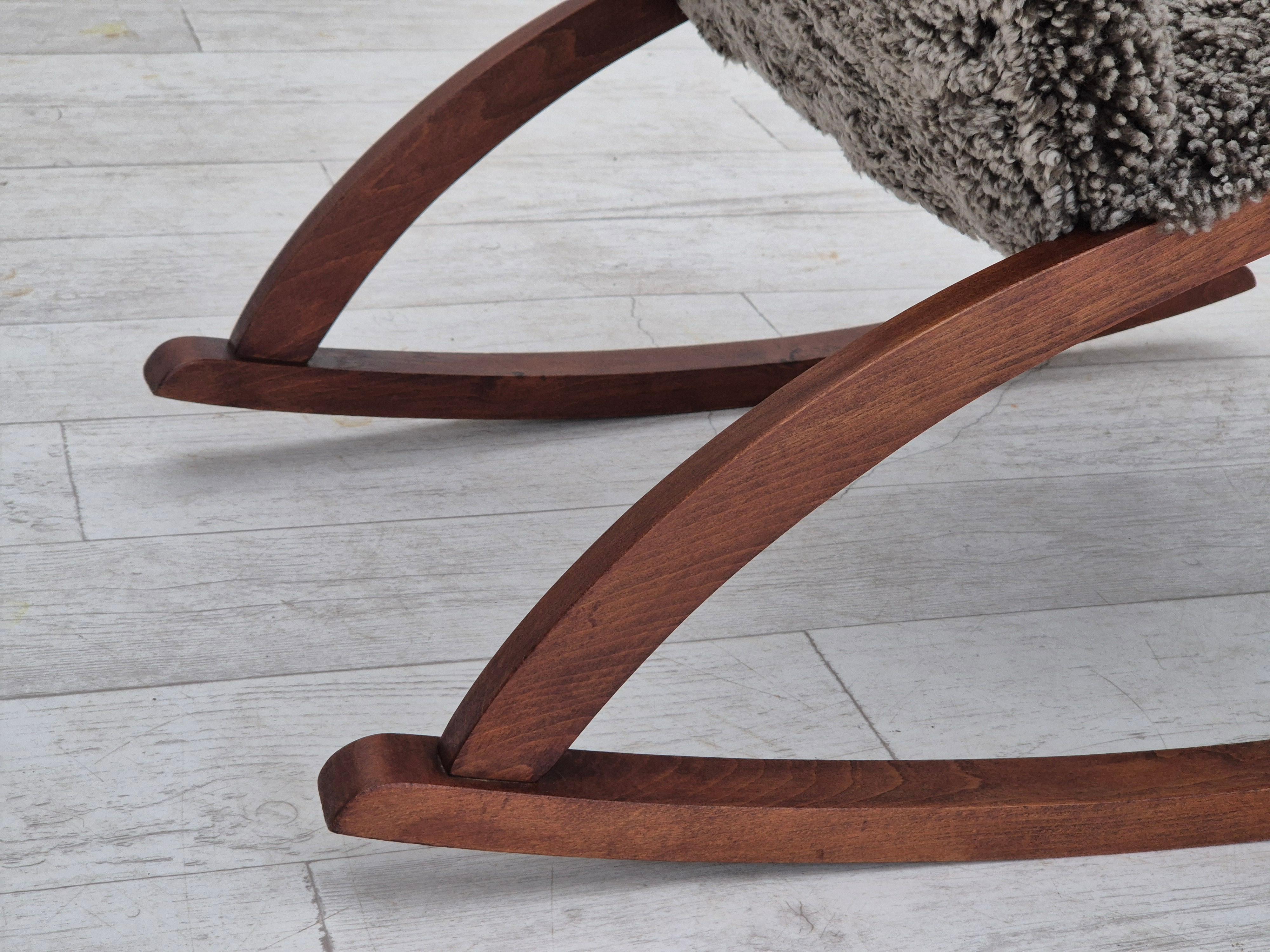 1960s, Scandinavian rocking chair, reupholstered in quality genuine sheepskin. 2