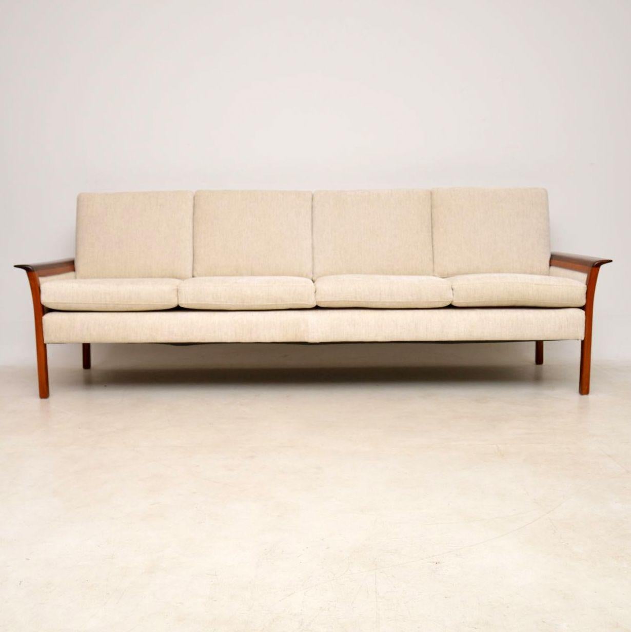 A stunning vintage four seat sofa designed by Knut Saeter for Vatne Mobler in Norway. Knut Saeter was actually the founder of the high end furniture company Vatne Mobler, and this set was designed in 1962. This particular one dates from the 1960s,