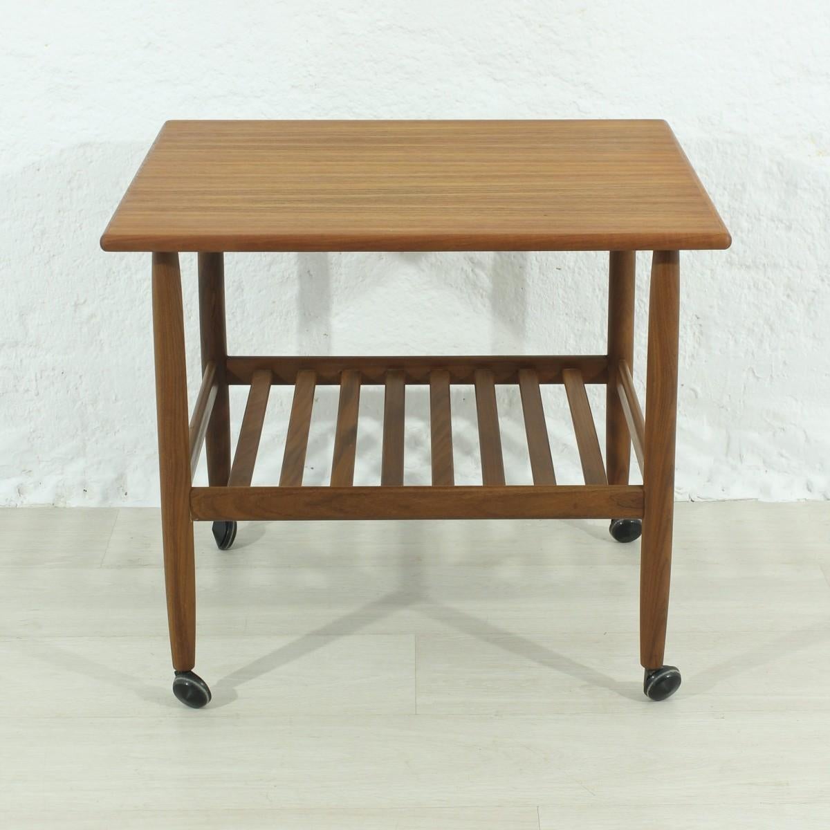 Material: Teak partly veneered; smoothed and oiled