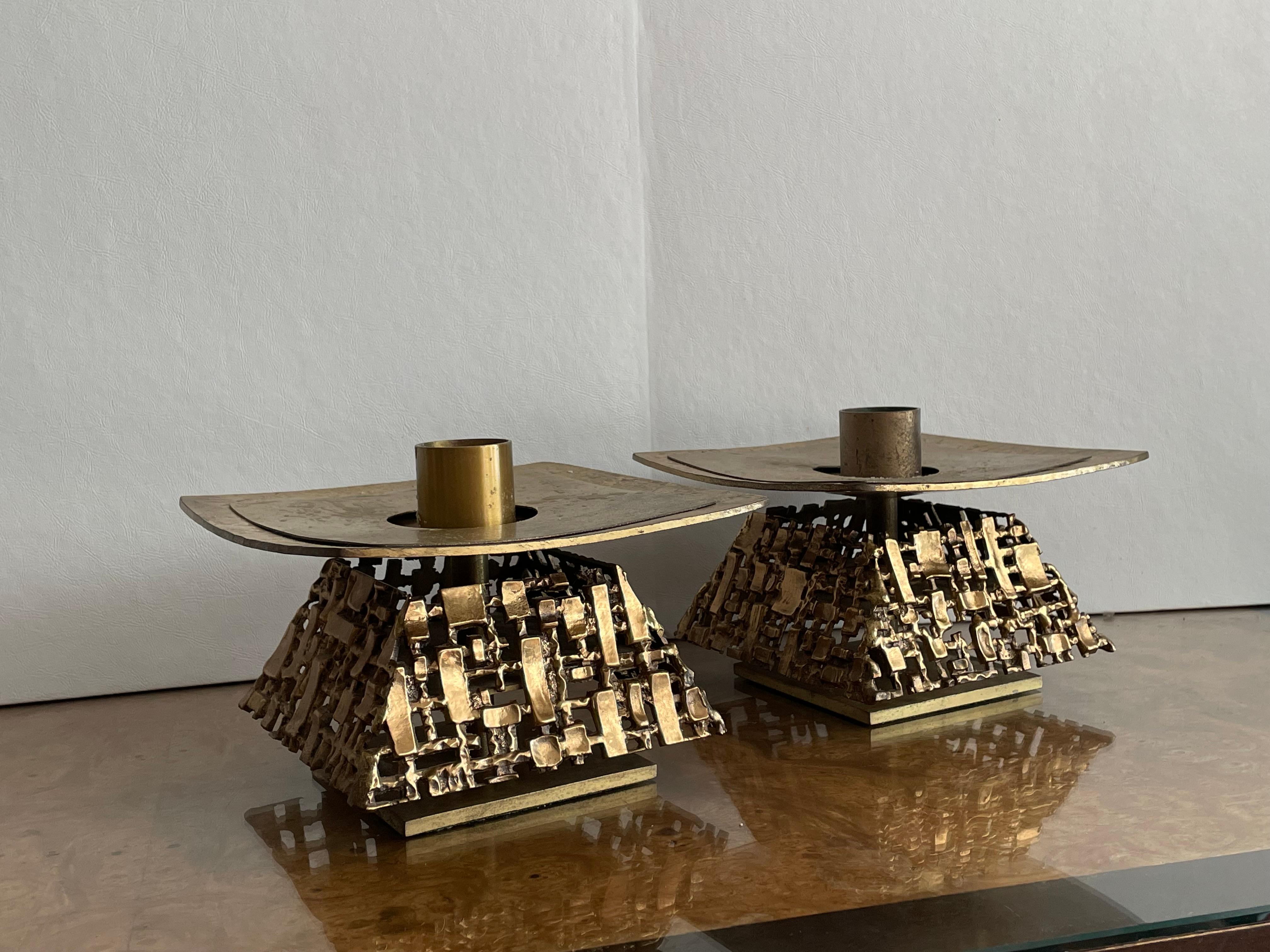 Super unique heavy solid brass candle holders that give you the option of narrow or wide candles.These were rescued out of a church in Bethlehem, Pennsylvania 