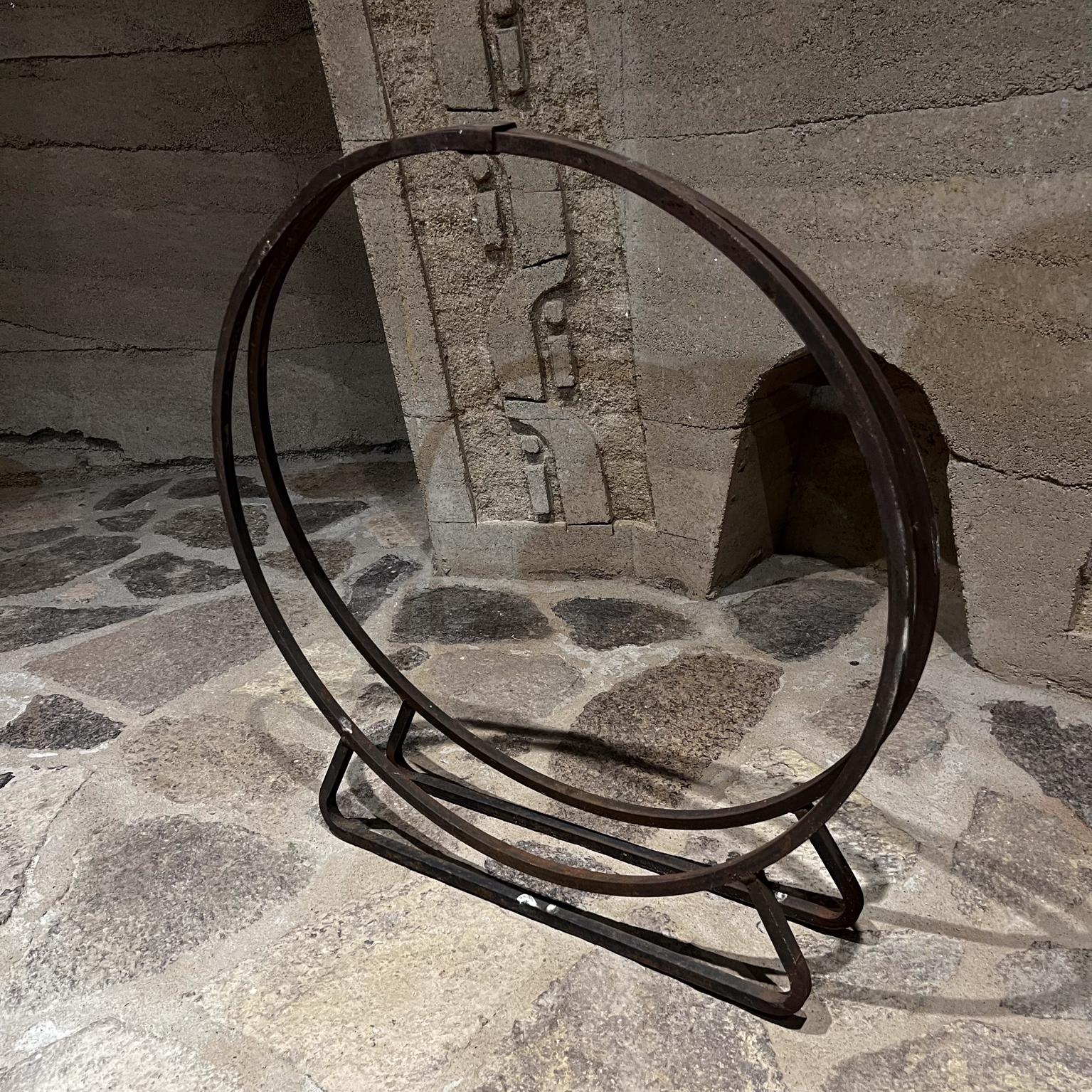 Mid-Century Modern 1960s Sculptural Black Wrought Iron Ring Firewood Holder For Sale