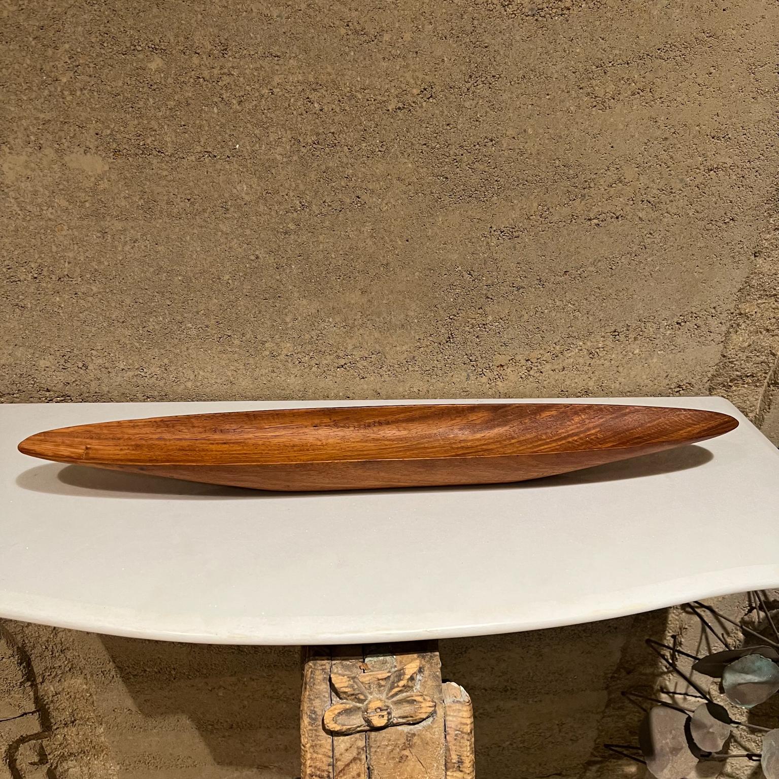 1960s Sculptural Modern Long Canoe bowl serving dish
Style of Jens Quistgaard Denmark
Unmarked
2 tall x 24 w x 3.75 d
Original preowned vintage condition.
Refer to images provided.