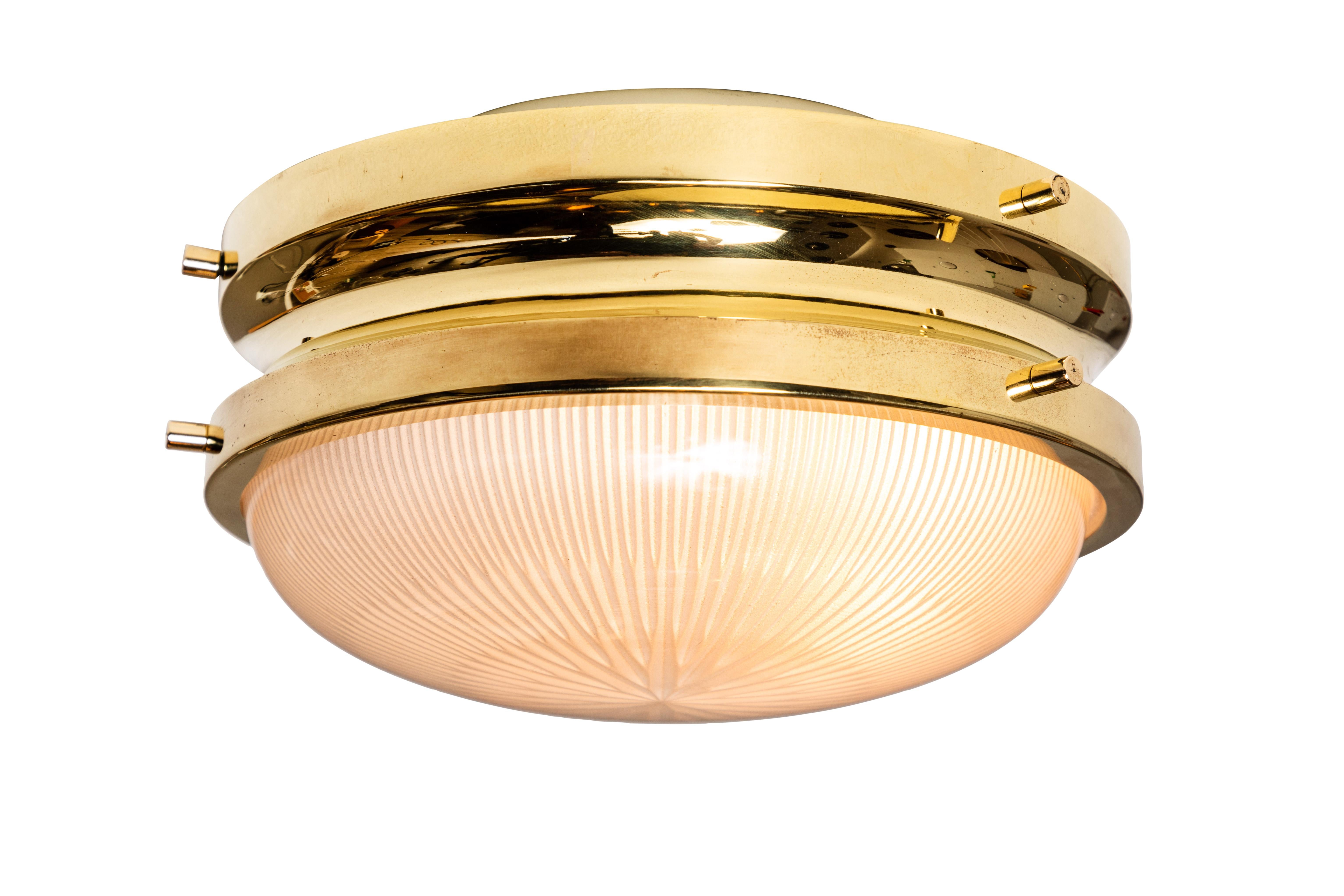 1960s Sergio Mazza Petite brass 'Sigma' wall or ceiling lights for Artemide. Executed in polished brass and pressed opaline glass. Professionally rewired for US electrical, accommodates a single 40 watt max incandescent candelabra bulb or higher