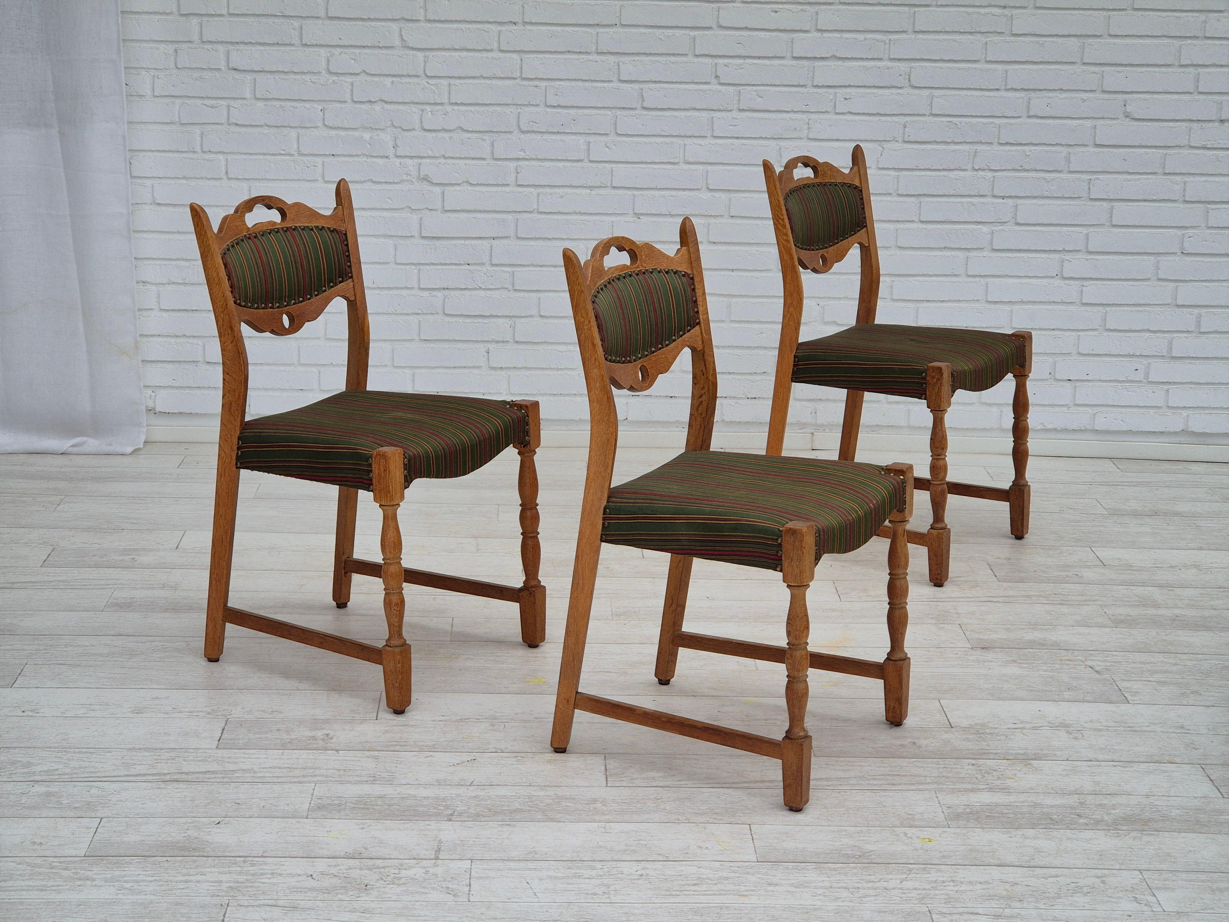1960s, set of 3 dining chairs in original good condition: no smells and no stains. Green/multi color furniture wool, oak wood. Manufactured by Danish furniture manufacturer in about 1960s.
