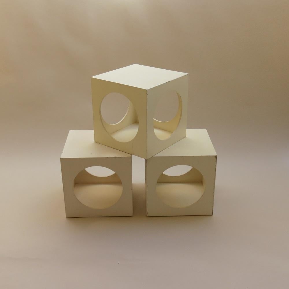 Set of 3 cube boxes made from plywood, painted white. Can be used in various configurations as tables, nightstands or for storage. Very versatile. In good vintage condition, signs of wear. Possibly been overpainted at some point, but this has been