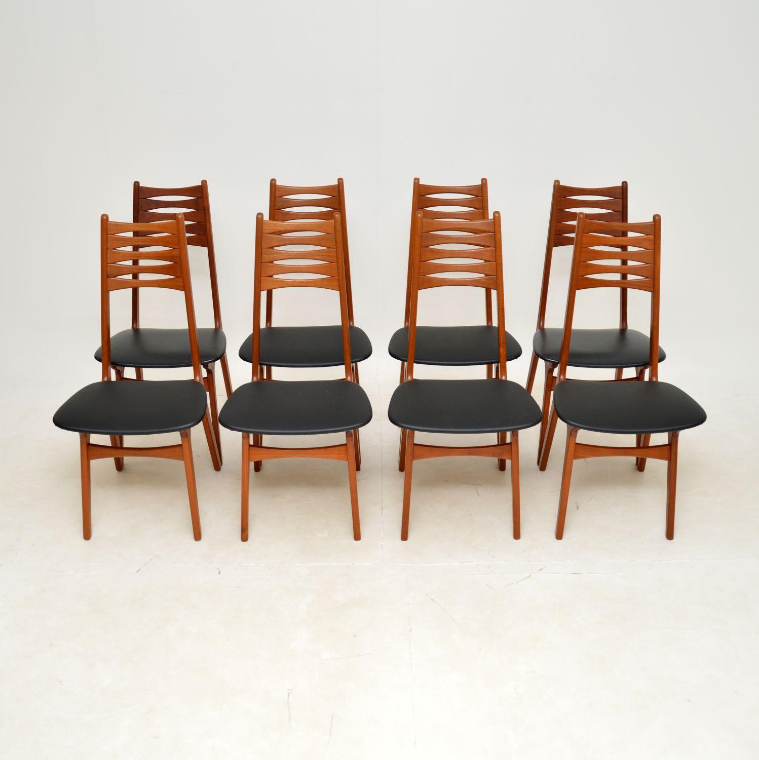 A very stylish and extremely well made set of eight vintage Danish dining chairs in solid teak. They were made in Denmark, and date from the 1960’s.

The quality is outstanding, they have a beautiful, sculptural design and look amazing from all