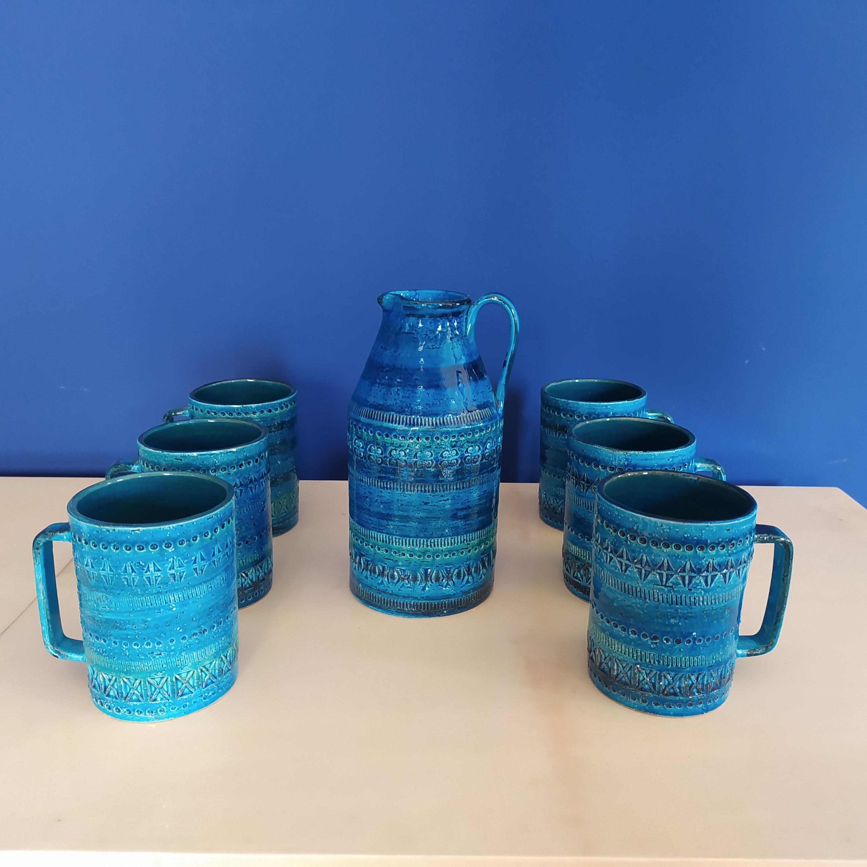 1960s set of a jug with six cups by Aldo Londi for Bitossi (Blue Collection) in ceramic. Made in Italy
The items are in excellent condition
