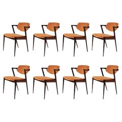 jeu de huit chaises de salle à manger Kai Kristiansen en palissandre des années 1960:: rechapage inclus