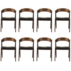 1960s Set of Eight Rosewood Dining Chairs Known as Model 32