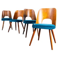 Ensemble de quatre chaises de salle à manger tapissées bleues des années 1960 - Oswald Haerdtl