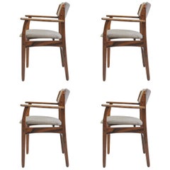 Ensemble de quatre fauteuils Erik Buch Modèle 50 en bois de rose des années 1960, retapissage inclus