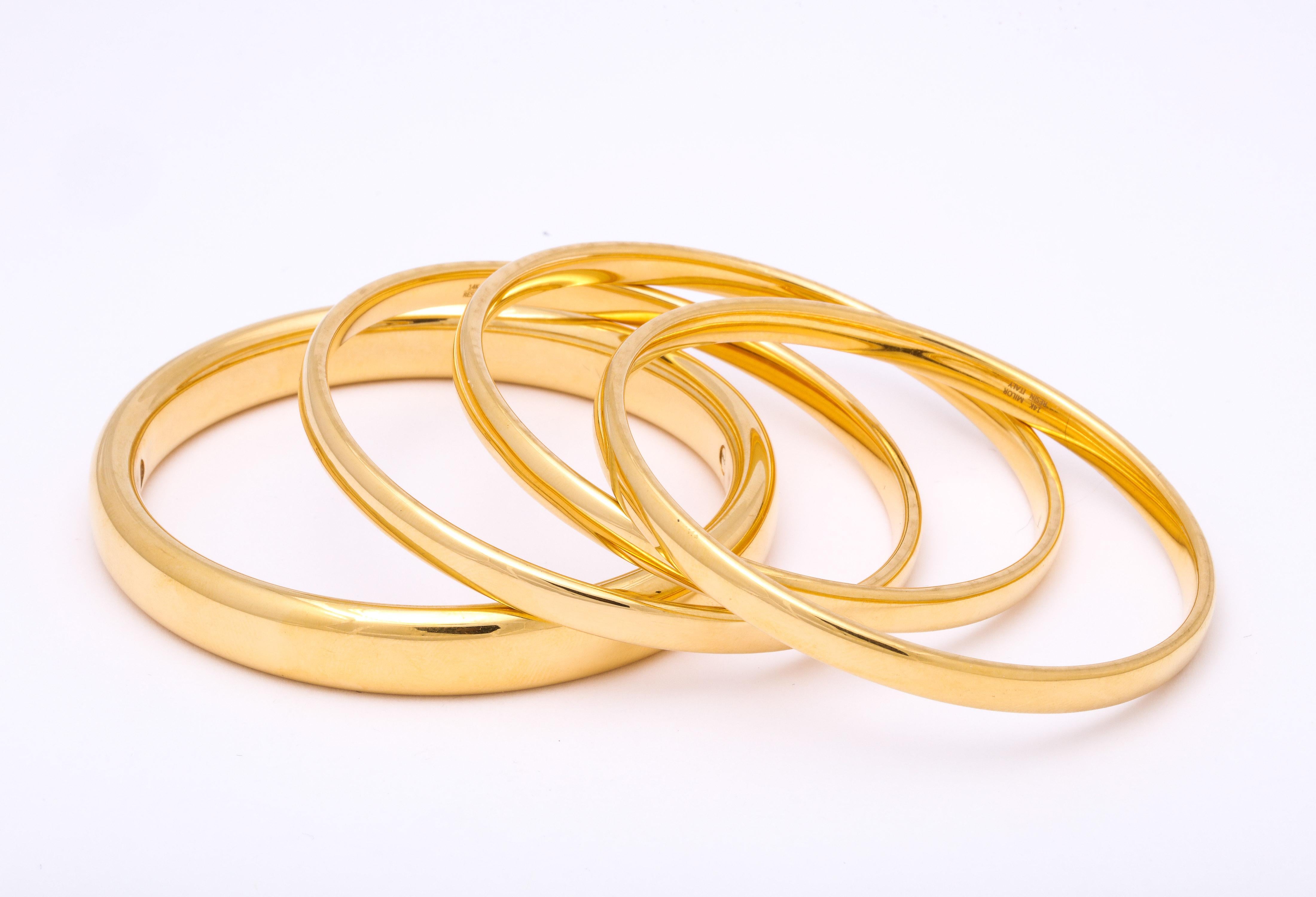 1960s Set of Four High Polish Gold Chic Bangles In Good Condition In New York, NY