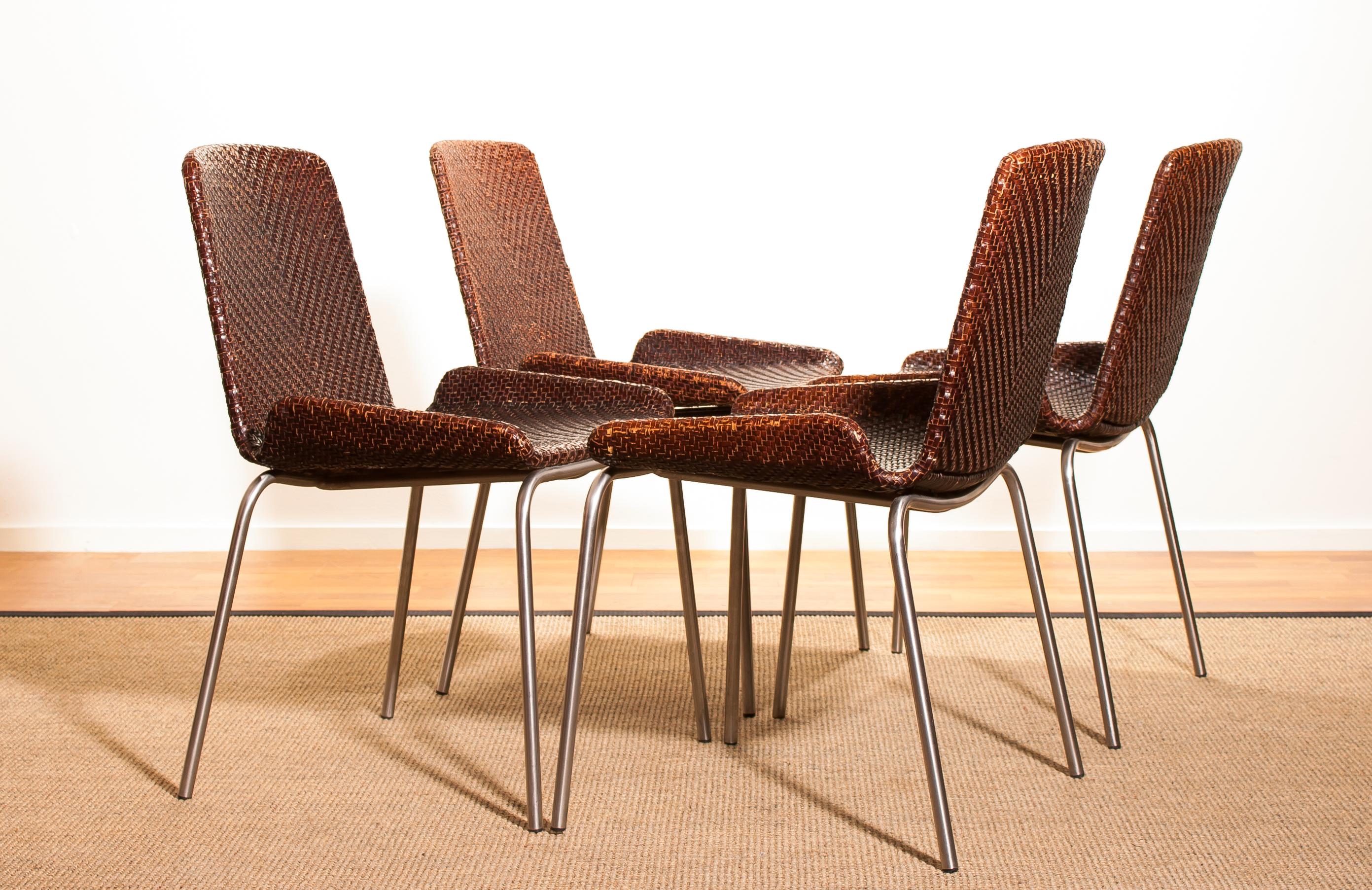 An amazing set of four dining chairs made in Italy.
These chairs have a brown leather braided seating and backrest on a steel frame.
They are in a wonderful condition.
Period 1960s
Dimensions: H 84 cm, W 51 cm, D 45 cm, SH 46 cm.
    