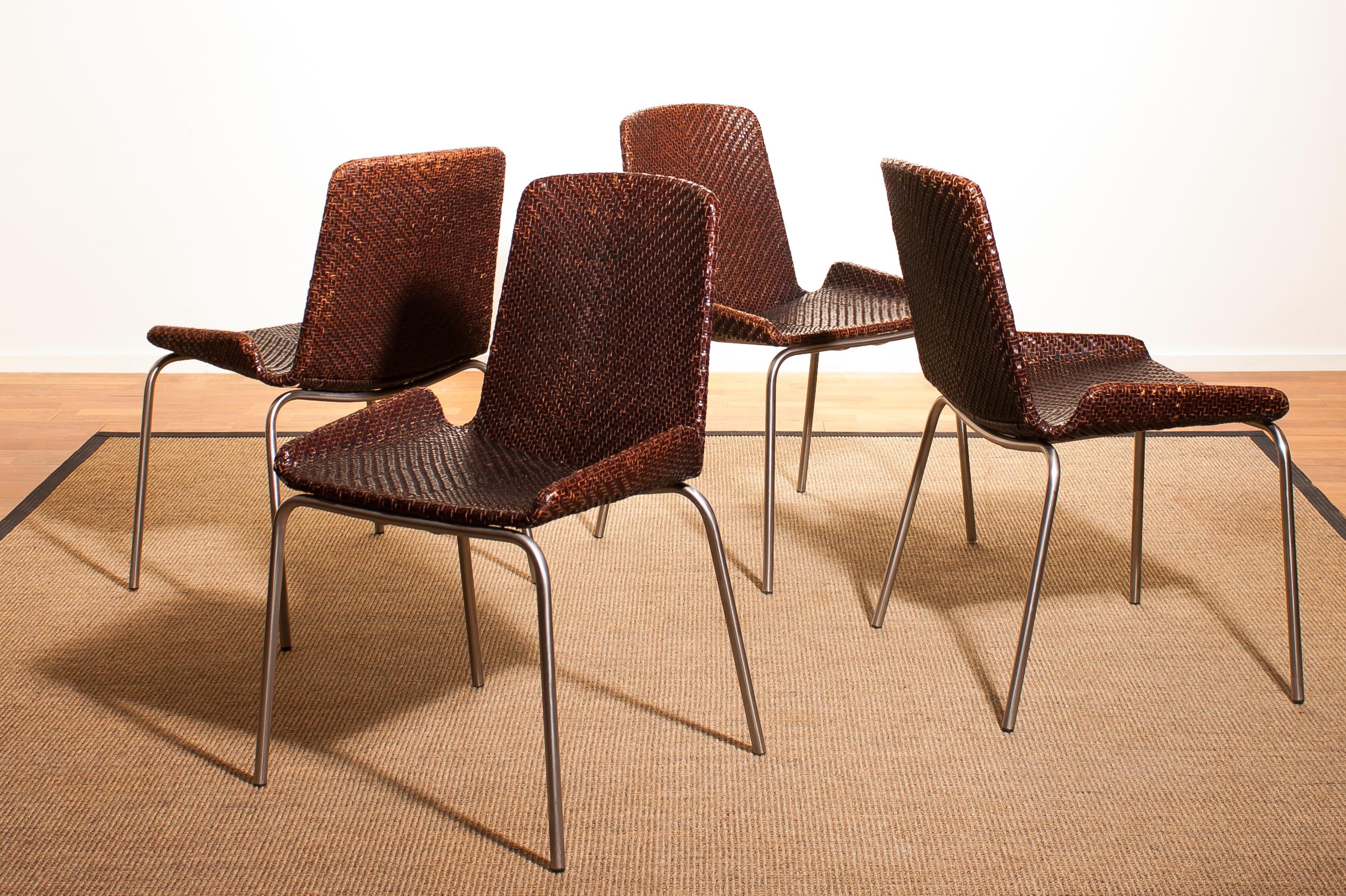 An amazing set of four dining chairs made in Italy.
These chairs have a brown leather braided seating and backrest on a steel frame.
They are in wonderful condition.
Period 1960s
Dimensions: H 84 cm, W 51 cm, D 45 cm, SH 46 cm.
   