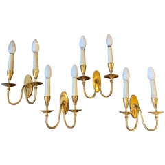Ensemble de quatre appliques murales élégantes de style mi-siècle moderne par Bruno Chiarini, années 1960