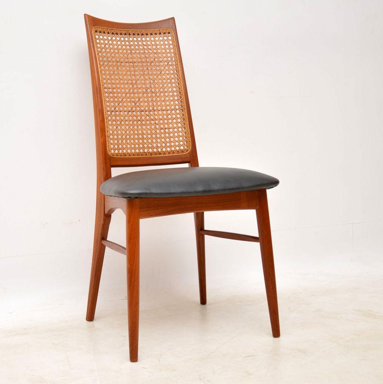 A beautiful and very rare set of Danish teak vintage dining chairs, these were designed by Niels Koefoed, they were made in Denmark by Koefoeds Hornslet in the 1960s. They are of amazing quality, with stunning rattan backs and a beautiful sculptural