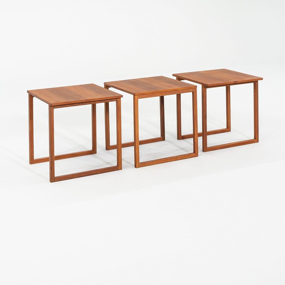 This is a set of 3 Model 33 Nesting Tables, originally designed by Kai Kristiansen in the 1960s. These particular examples were produced by Vildbjerg Mobelfabrik in Denmark. The tables design is comprised entirely of teak wood.
 
 Each table