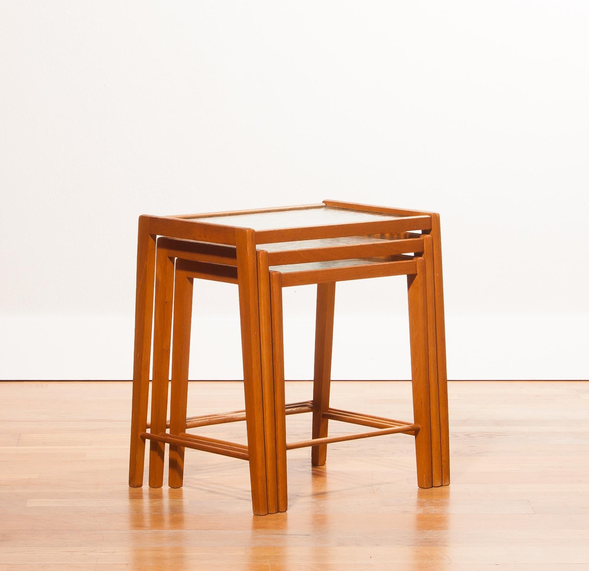 Mid-20th Century 1960s, Set of Three Oak and Glass Nesting Tables, Sweden For Sale