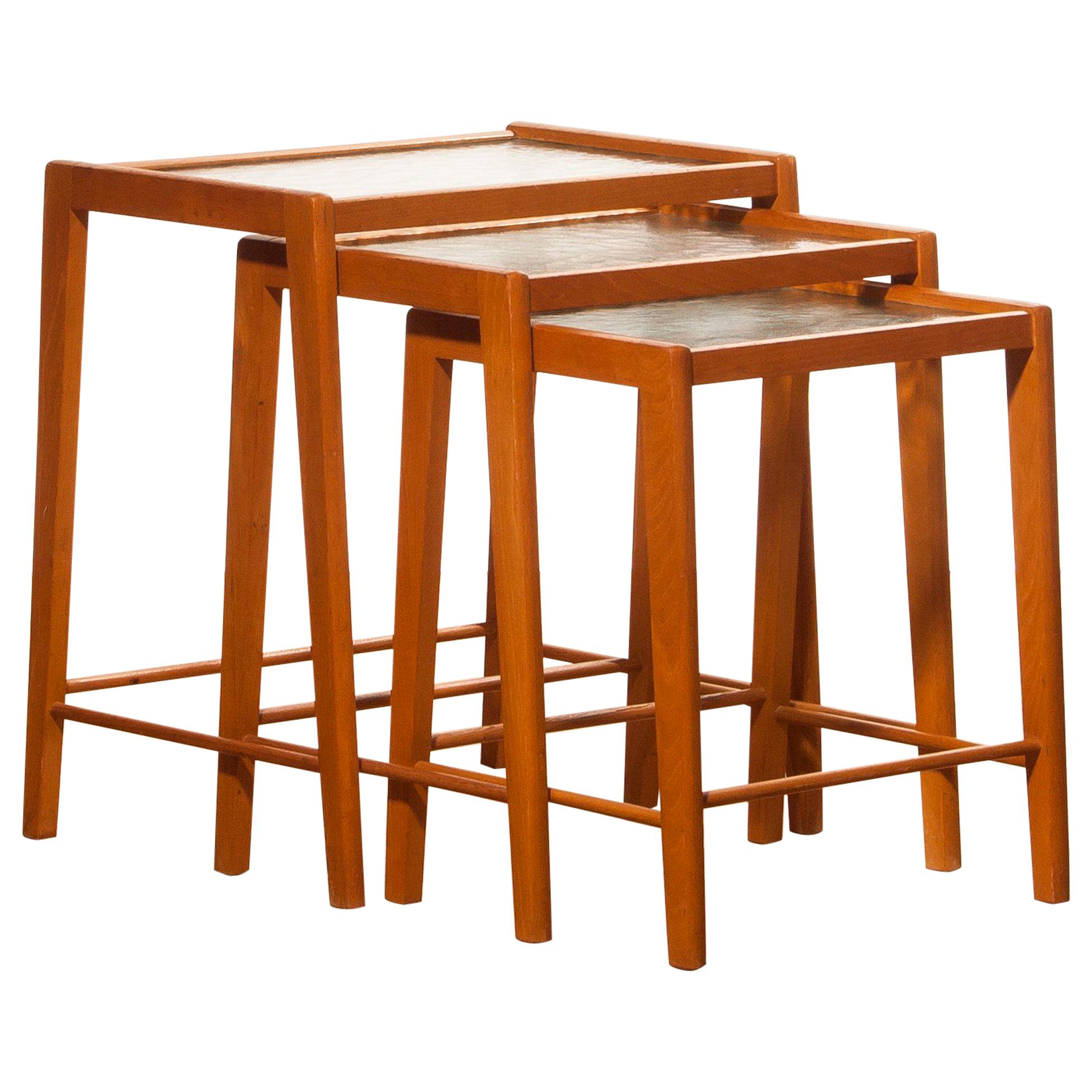 A lovely set of three nesting tables.
This beautiful set is made of beech with glass tops.
They are in very nice condition.
Period, 1960s.
Dimensions: H 50 cm, W 46 cm, D 31 cm
H 46 cm, W 41 cm, D 29 cm
H 42 cm, W 36 cm, D 27 cm.

