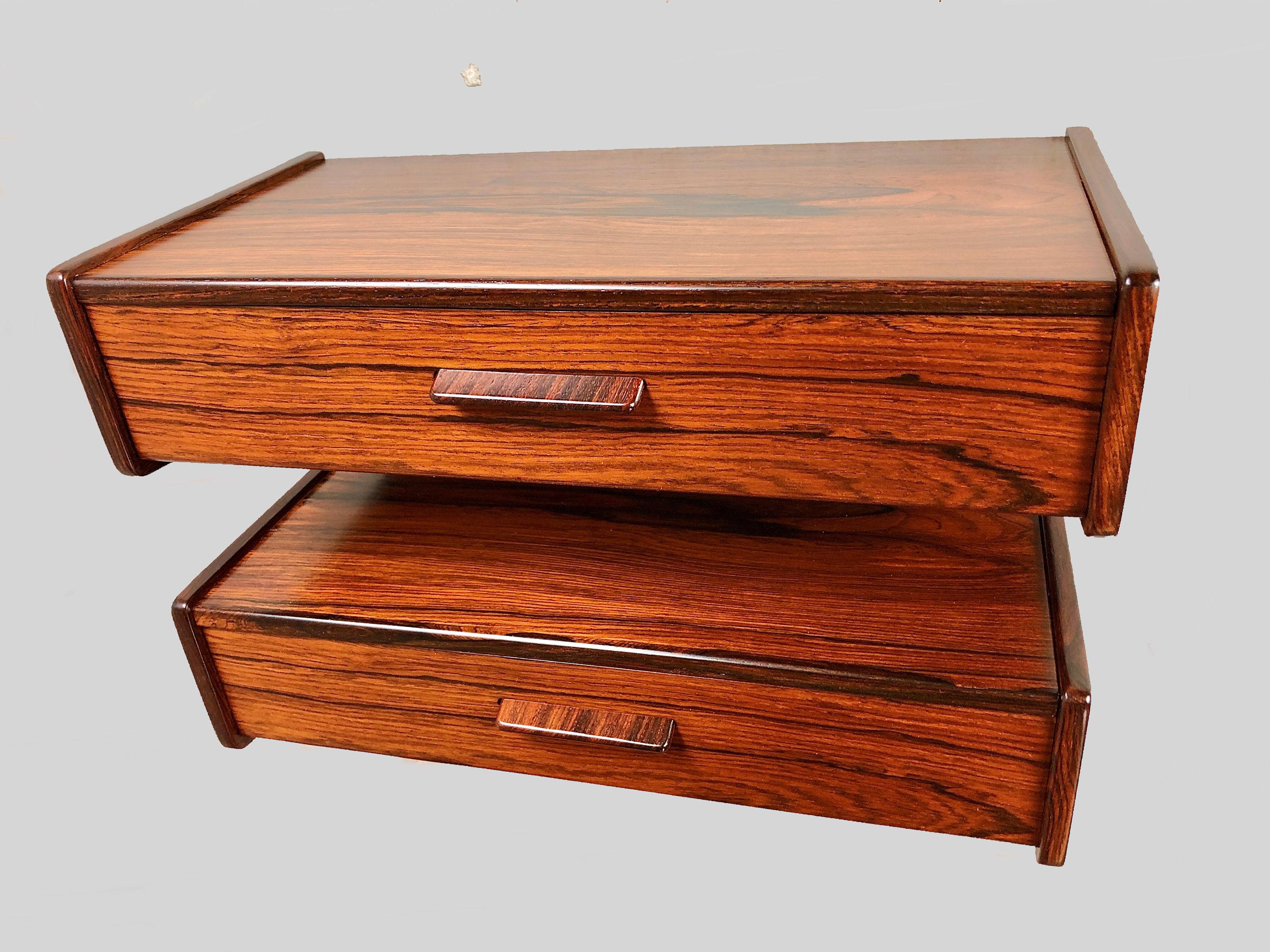 1960's Set of two Danish floating nightstands in rosewood. 

The simple yet elegant designed nightstands each with a single drawer have been checked restored if needed and refinished by our cabinetmaker to ensure that they are in very good