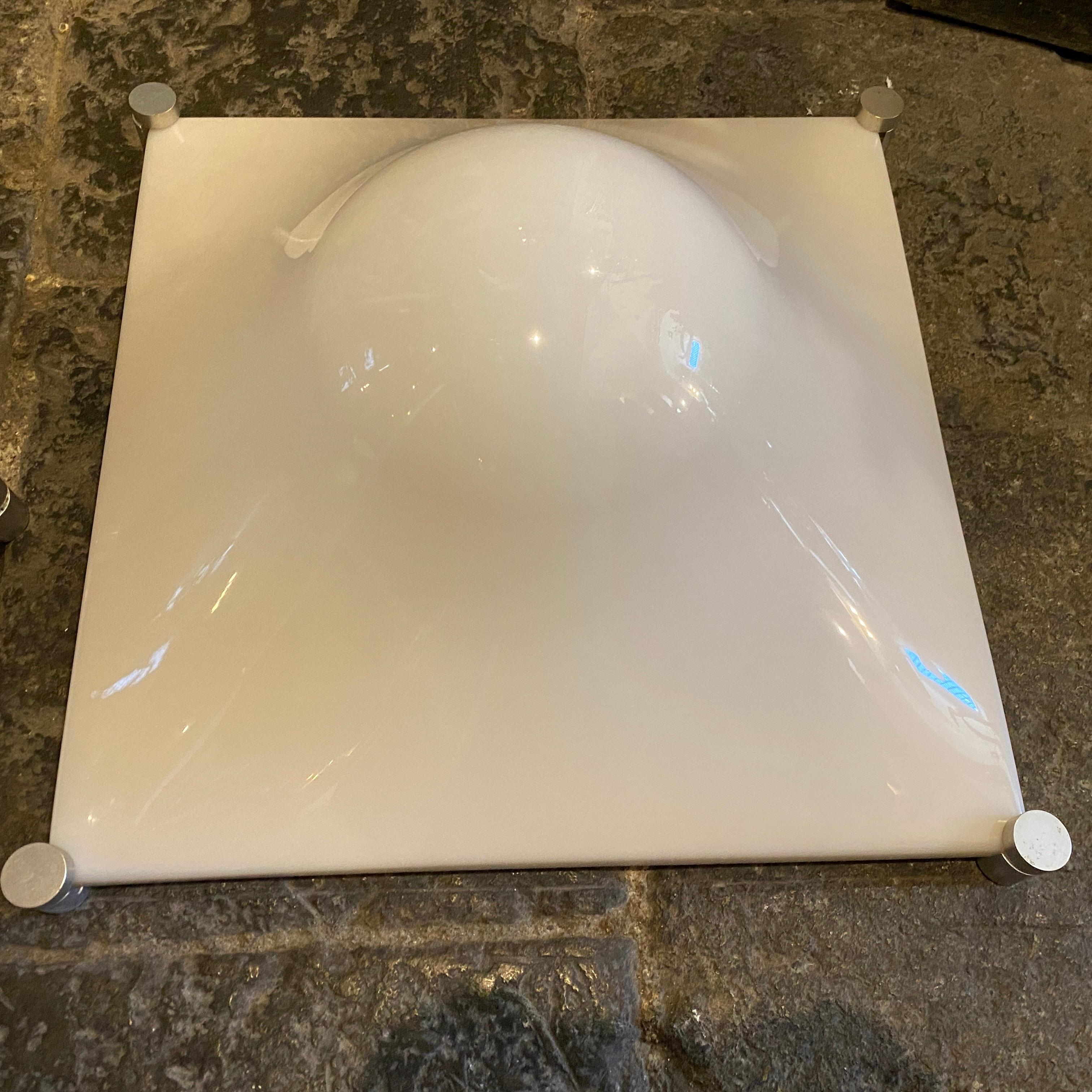 Two square wall lights also usable as ceiling light designed in 1965 by Elio Martinelli and manufactured in Italy in the Space Age Era, acrylic and aluminium parts are in very good conditions. The Bolla Wall Lights by Elio Martinelli, showcases a