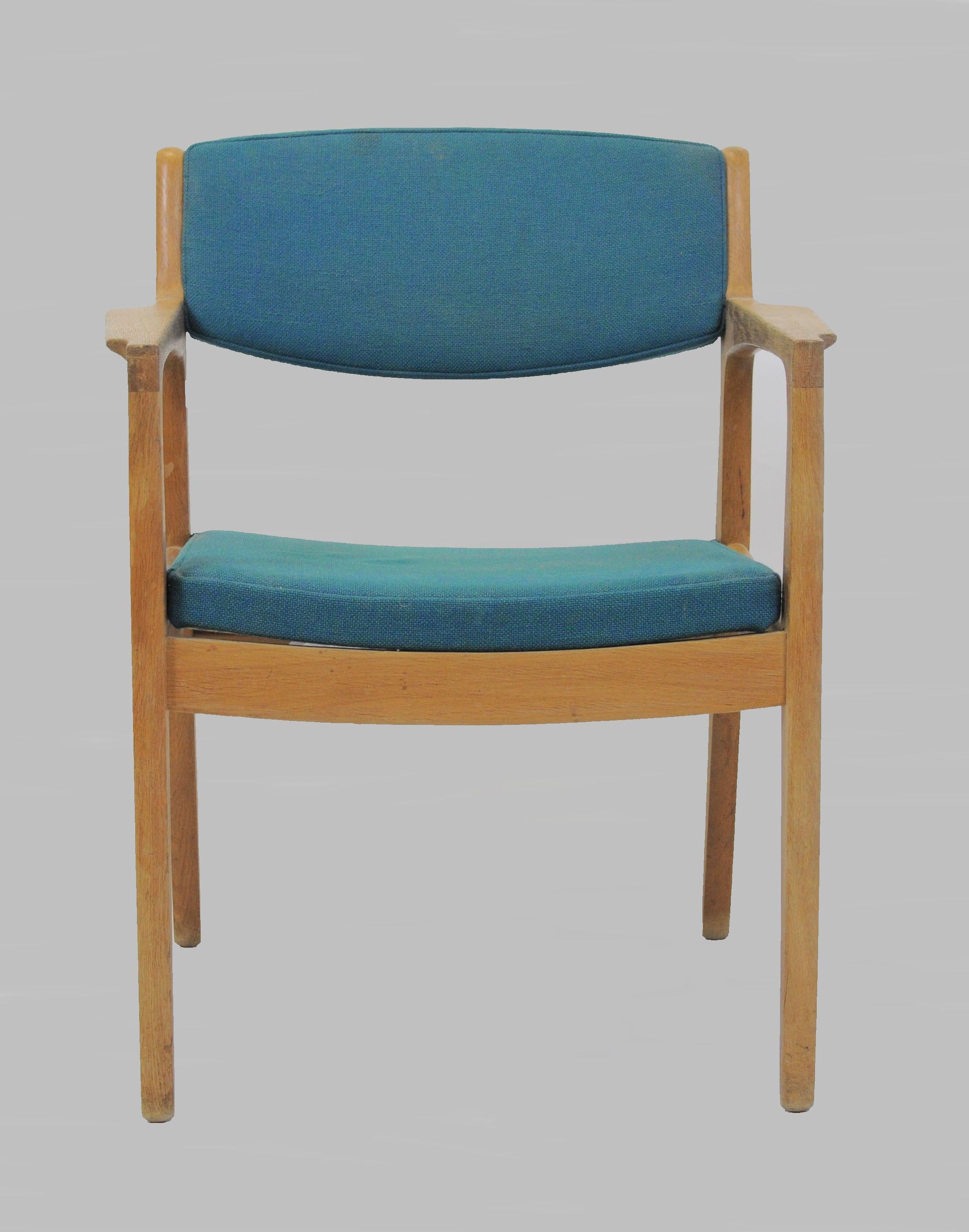 1960s armchairs designed by Erik Buch and produced by Ørum Møbler.

The comfortable chairs are made of a solid oak frame. The chairs have been overlooked and refinished by our cabinetmaker to insure that they are in very good condition with only