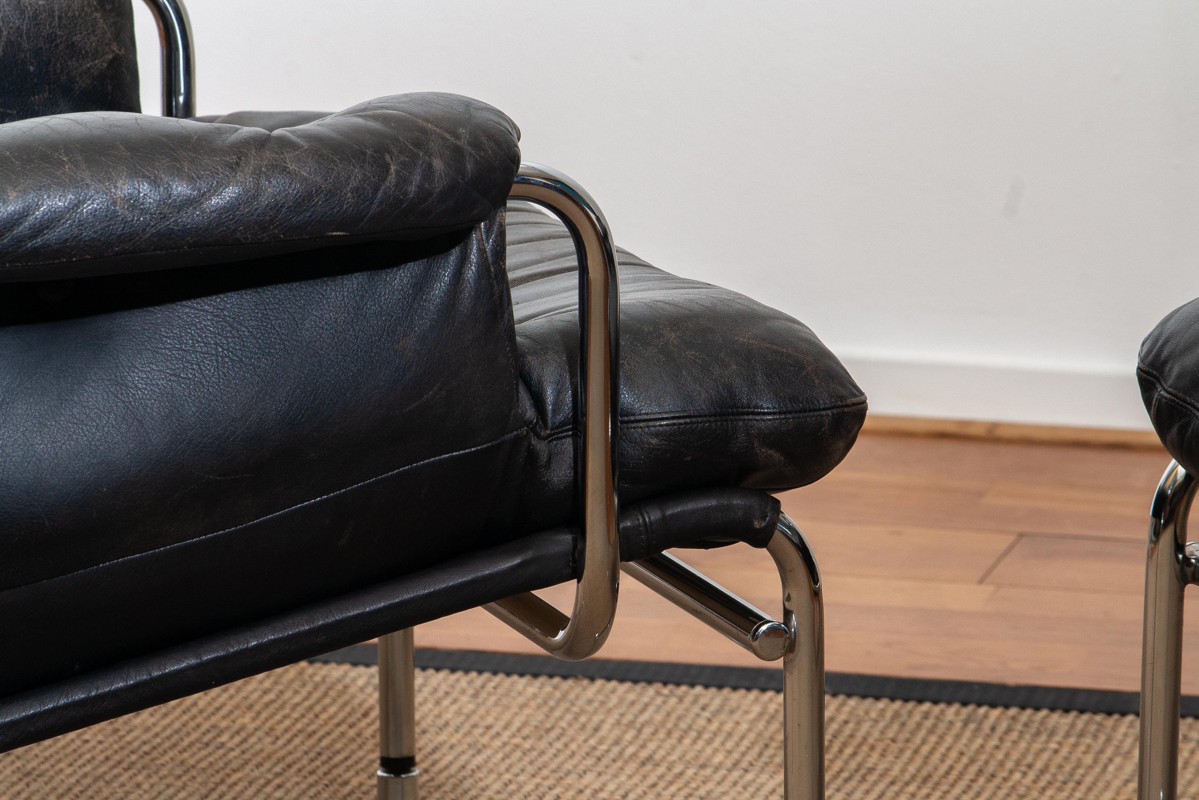 1960s Set of Two Eva Lounge Chairs in Chrome and Aged Black Leather by Lindlöfs 4