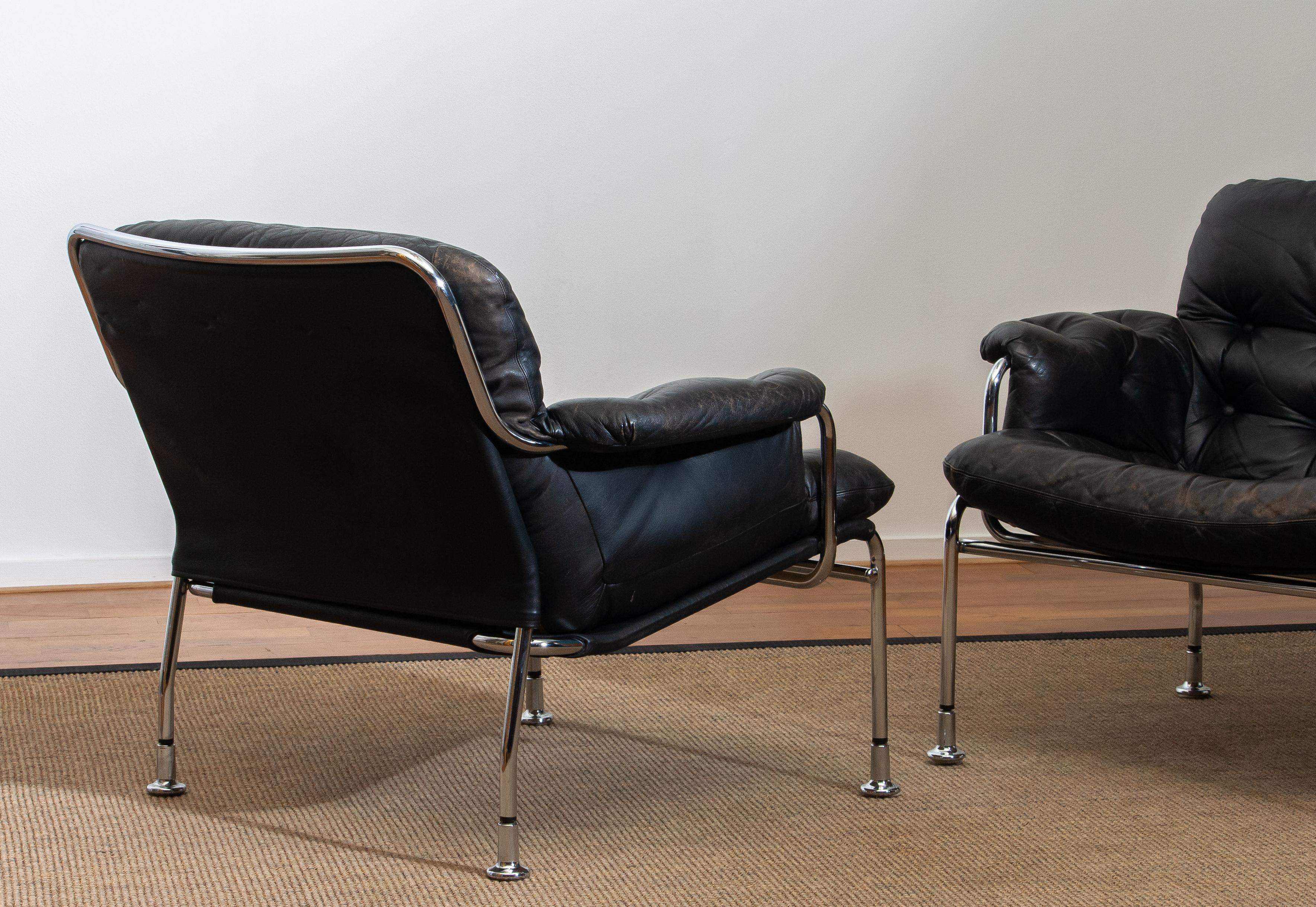 Mid-20th Century 1960s Set of Two Eva Lounge Chairs in Chrome and Aged Black Leather by Lindlöfs