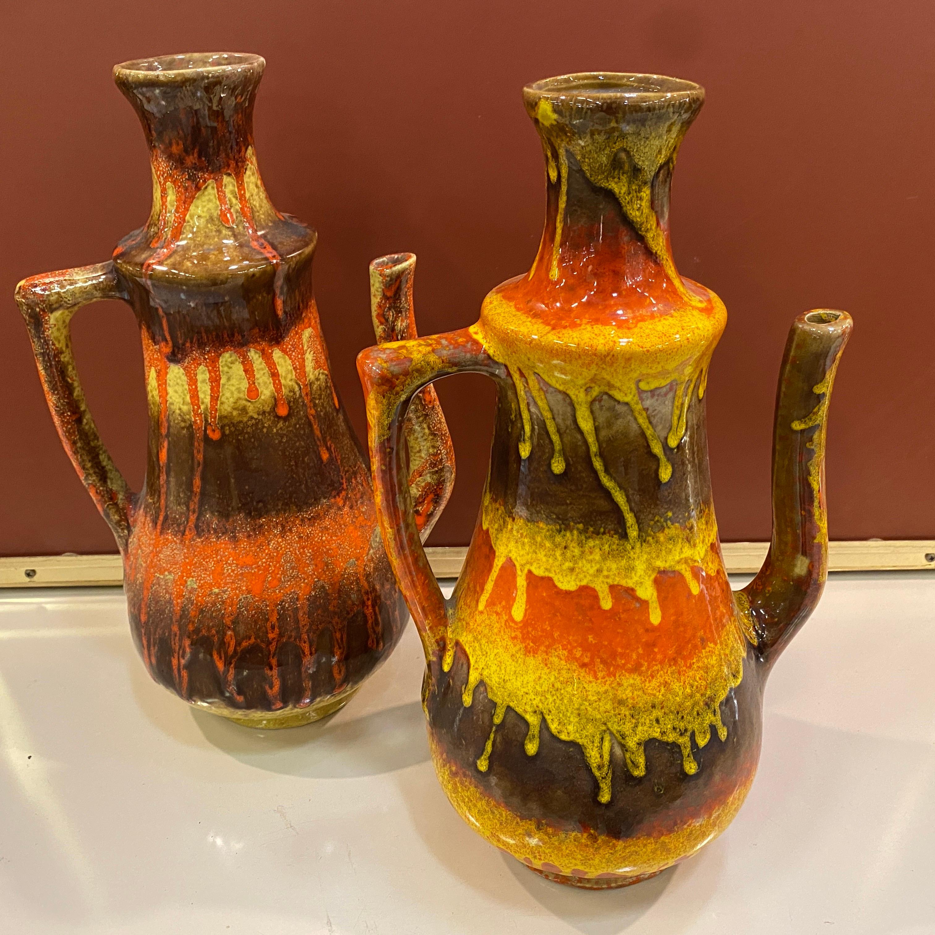 Two multi colored ceramic huge jugs designed and hand-crafted in Italy by ceramica Artigiana Umbra, small manufacturer founded in 1956 in Città di Castello. They are in perfect conditions.