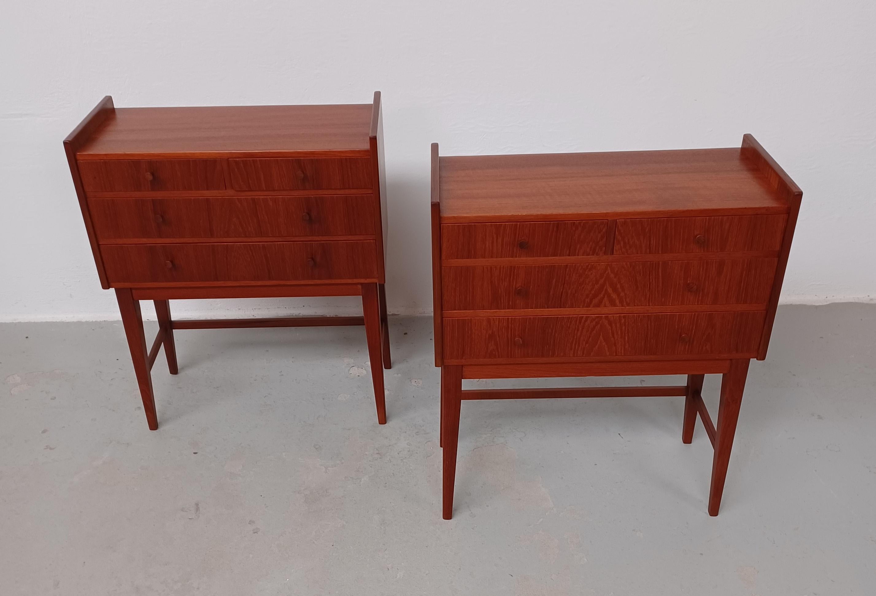 1960s Set of two small fully restored and refinished Danish teak dressers or nightstands.

Two identical small teak dresser each with 4 drawers that will do well together in almost any room they are placed in... as dressers, sidetables, entry