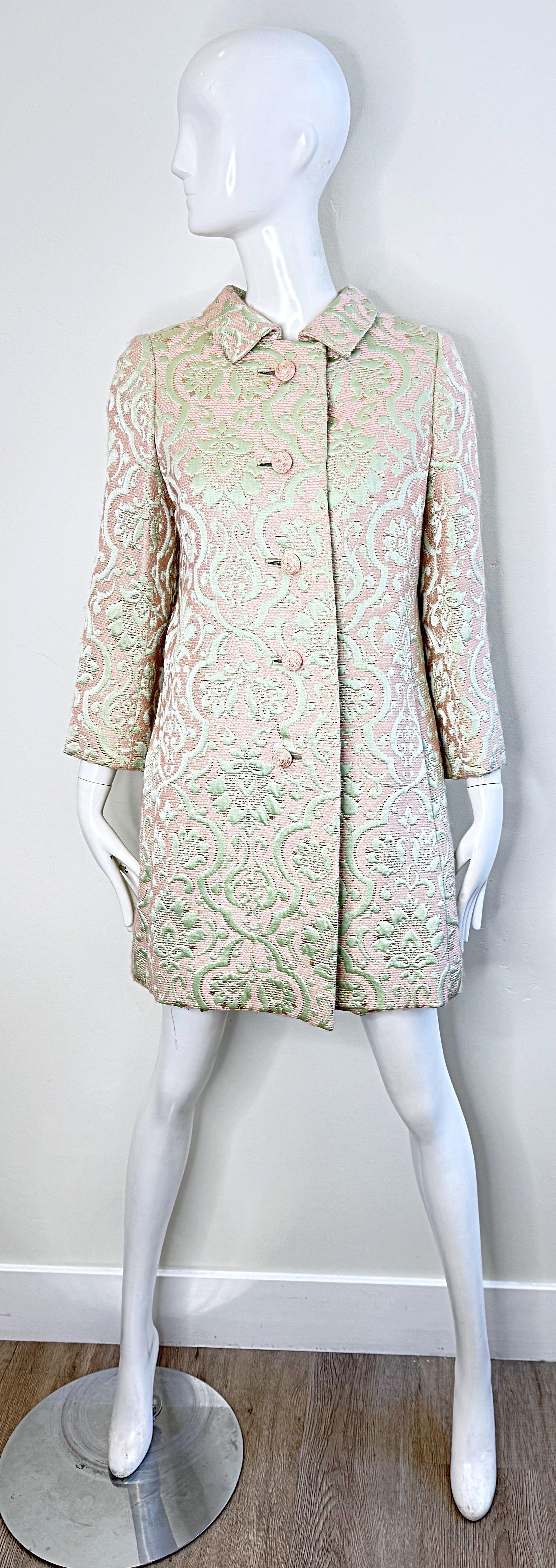 Chic 1960s Seymour Fox light pink and ivory silk brocade A-Line dress and matching jacket ! Originally sold at high-end Detroit boutique, Julie’s. Dress features a tailored bodice with an A Line skirt. Pockets at both sides of the waist. Hidden