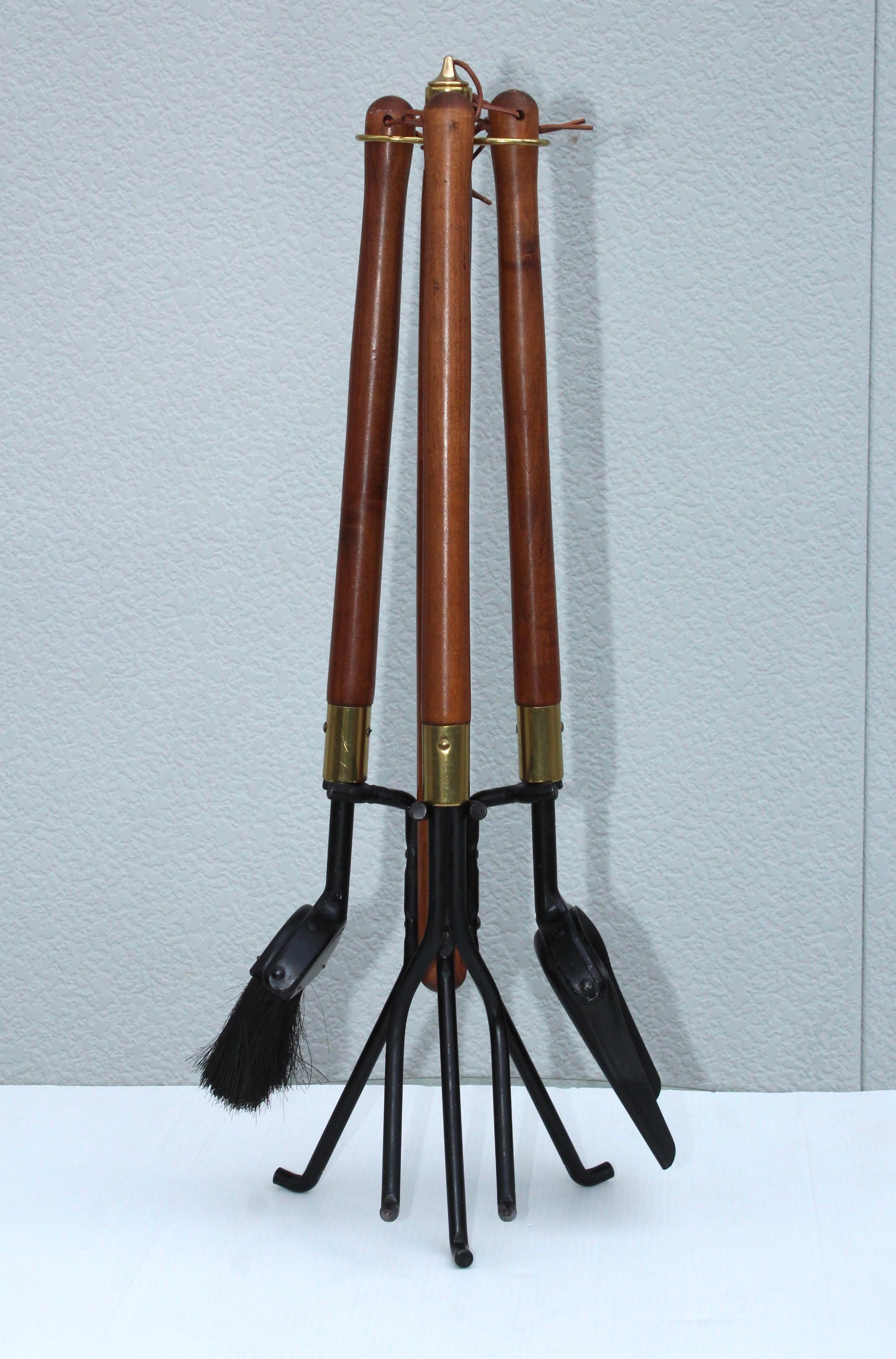 1960s Mid-Century Modern walnut and iron with brass detail fireplace tools by Seymour.