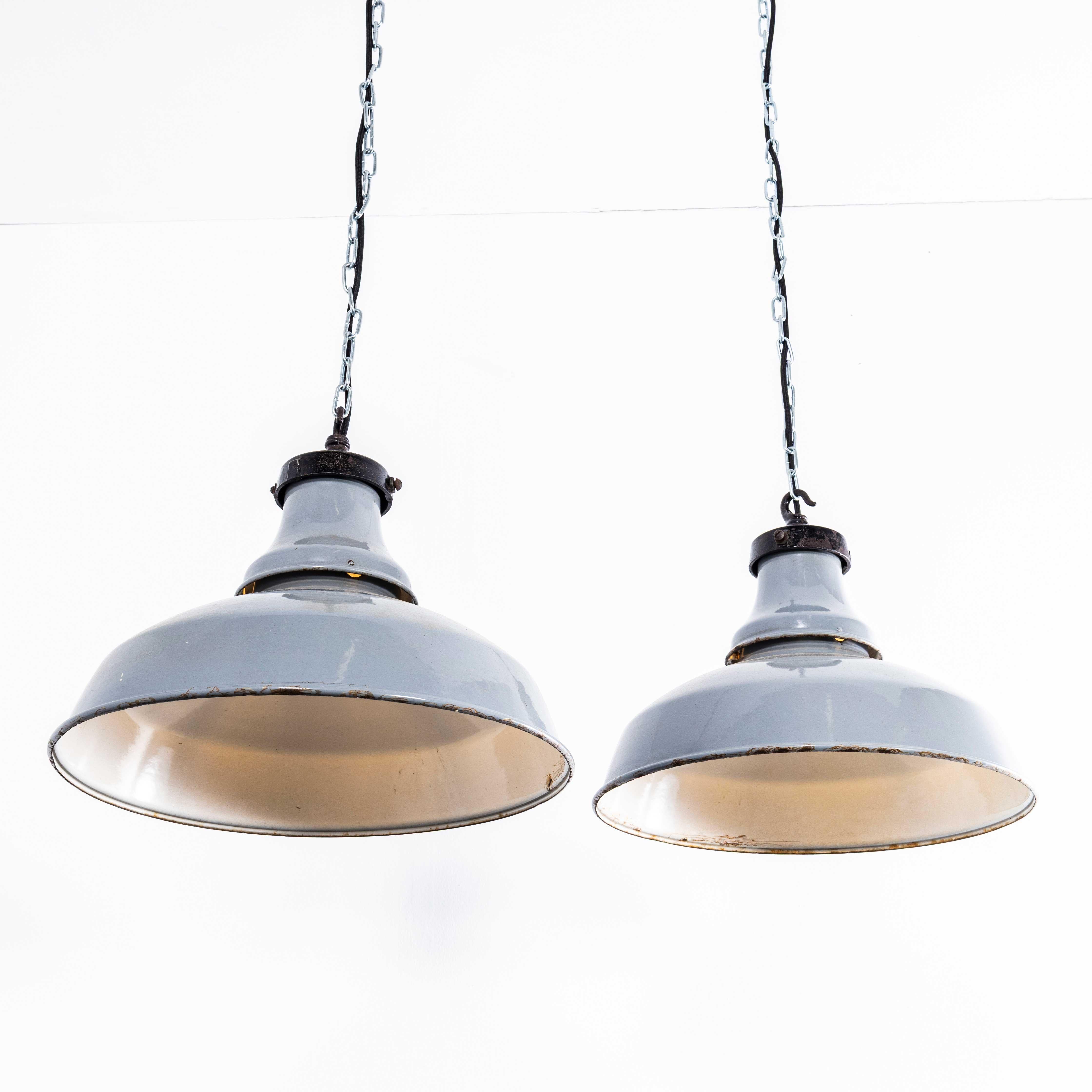 1960’s Shallow Domed GEC Enamelled Pendant Lamps – 16 Inch – Pair. 

GEC, or The General Electric Company, had a significant history in the development of lighting in Britain. Founded in 1886, it was a major electrical component manufacturer and a