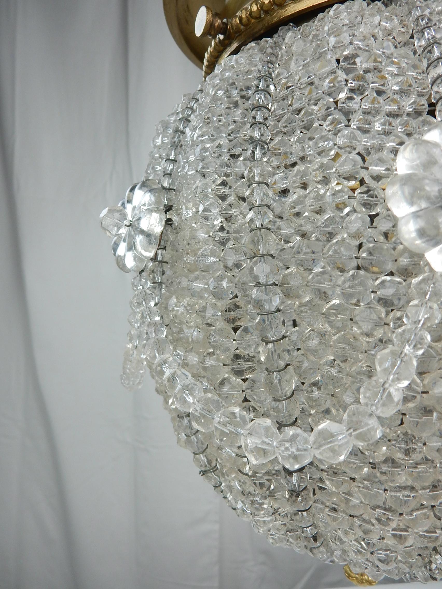 Large single standard bulb flush mount ceiling lamp fixture by
Sherle Wagner collection, circa 1960s.
Wire stranded glass beads over a metal skeleton ball.
Fabulous when lit.