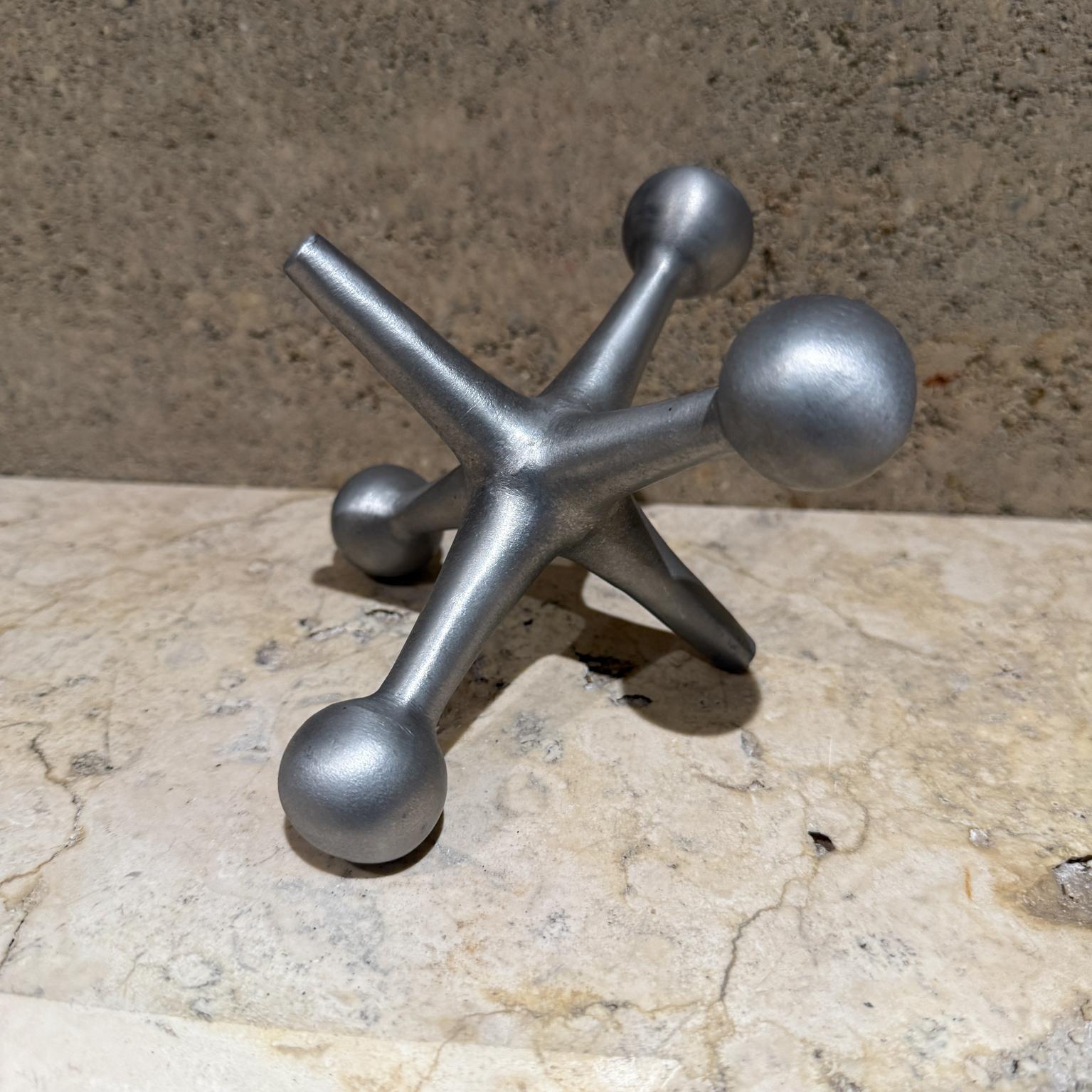 Mid-Century Modern 1960s Silver Jack Bookend after Bill Curry George Nelson For Sale