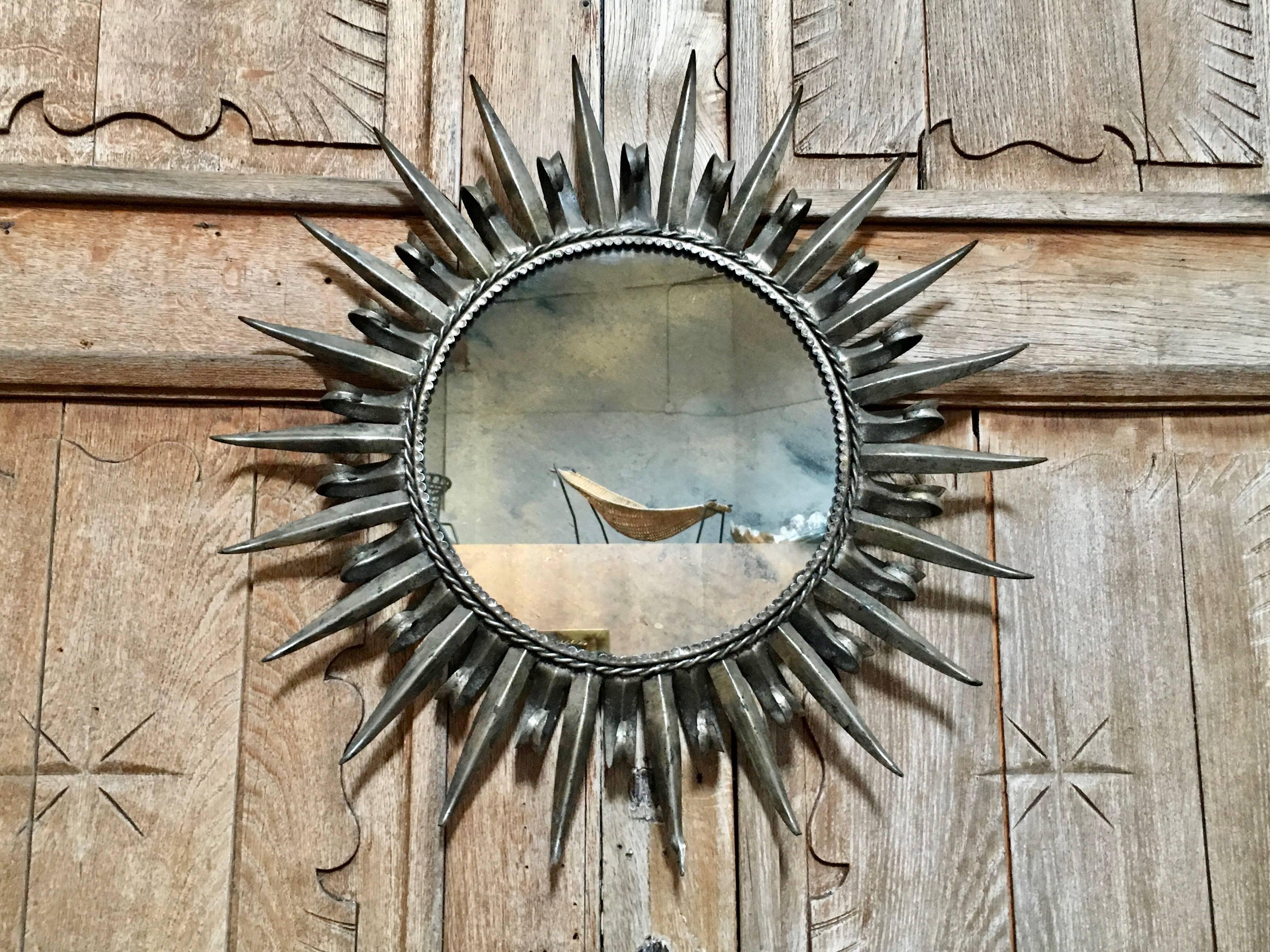 silver sunburst mirror