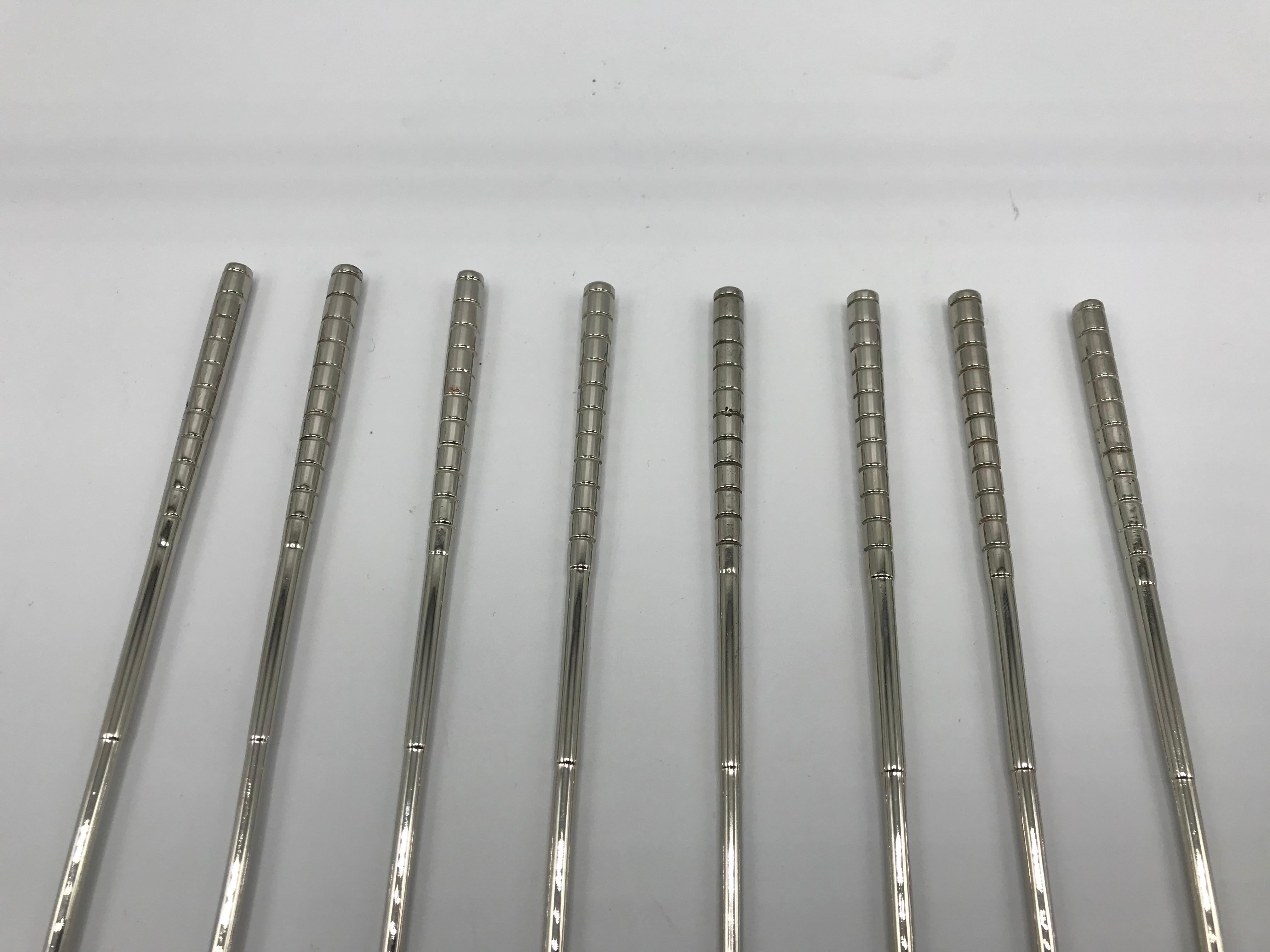 Offered is a fabulous, set of eight, 1960s silver plate golf club shaped cocktail stir-sticks. The set are perfect for any golf enthusiast or country-club inspired bar. Fairly heavy, considering their size.