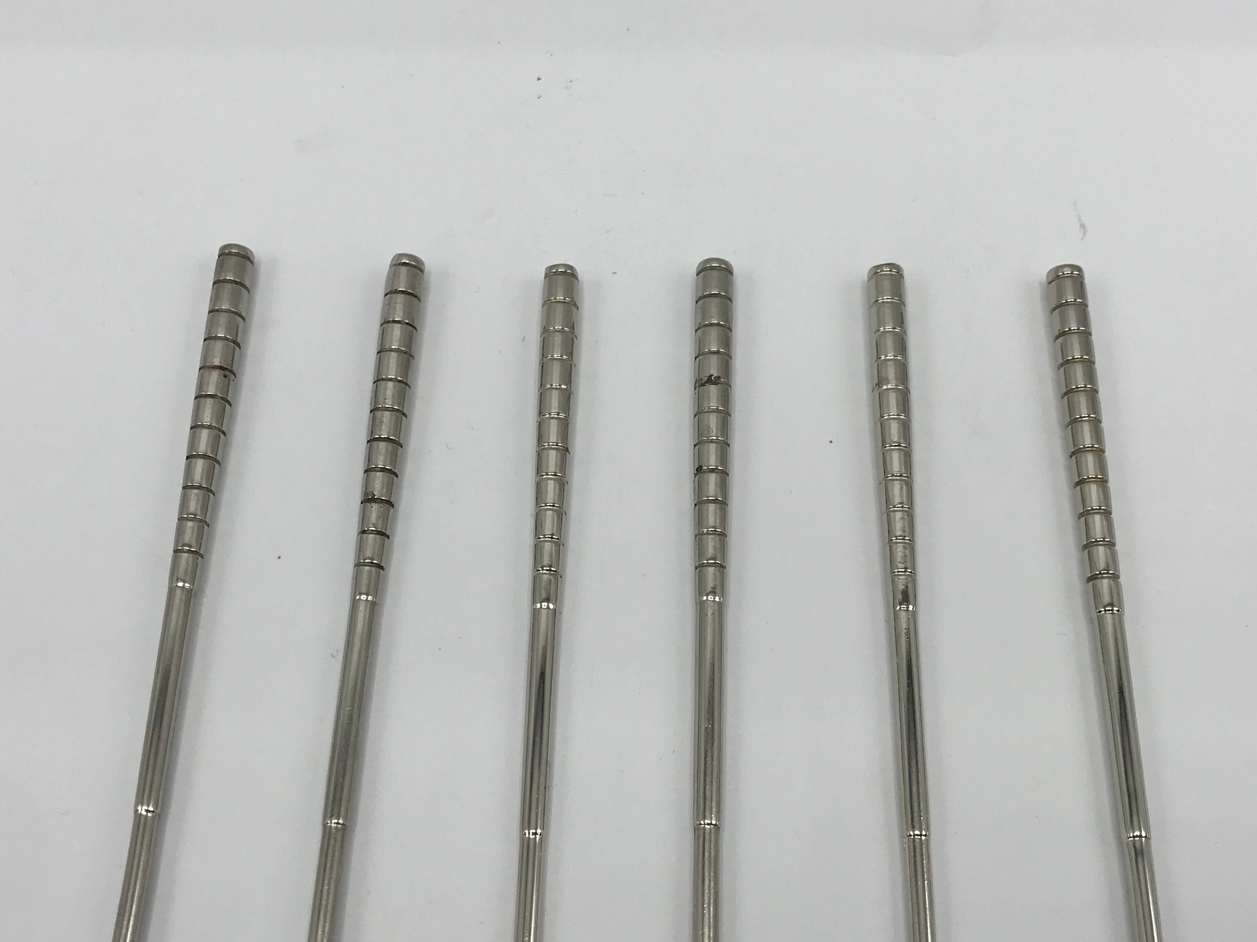 Offered is a fabulous, set of six, 1960s silver plate golf club shaped cocktail stir-sticks. The set are perfect for any golf enthusiast or country-club inspired bar. Fairly heavy, considering their size.
