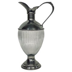 Jarra o aguamanil de plata y cristal de los años 60