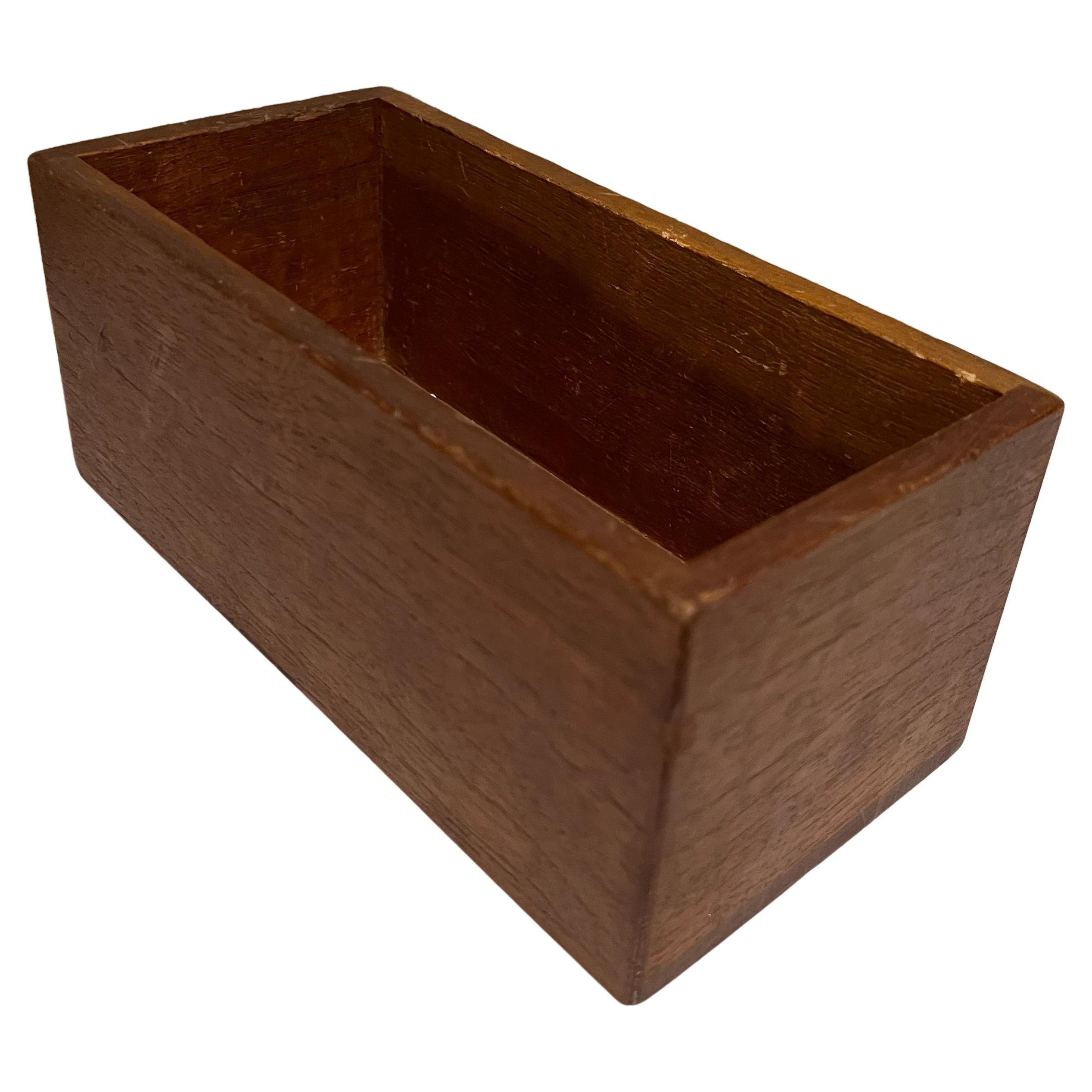 1960s Exotic Wood Simple Storage Box Ideal Cedar Catch All Minimalist Design
Old storage box looks like cedar. No lid or cover is present.
Measures :3.75 tall x 9 width x 4.5 depth
Original preowned vintage good condition.
See images provided