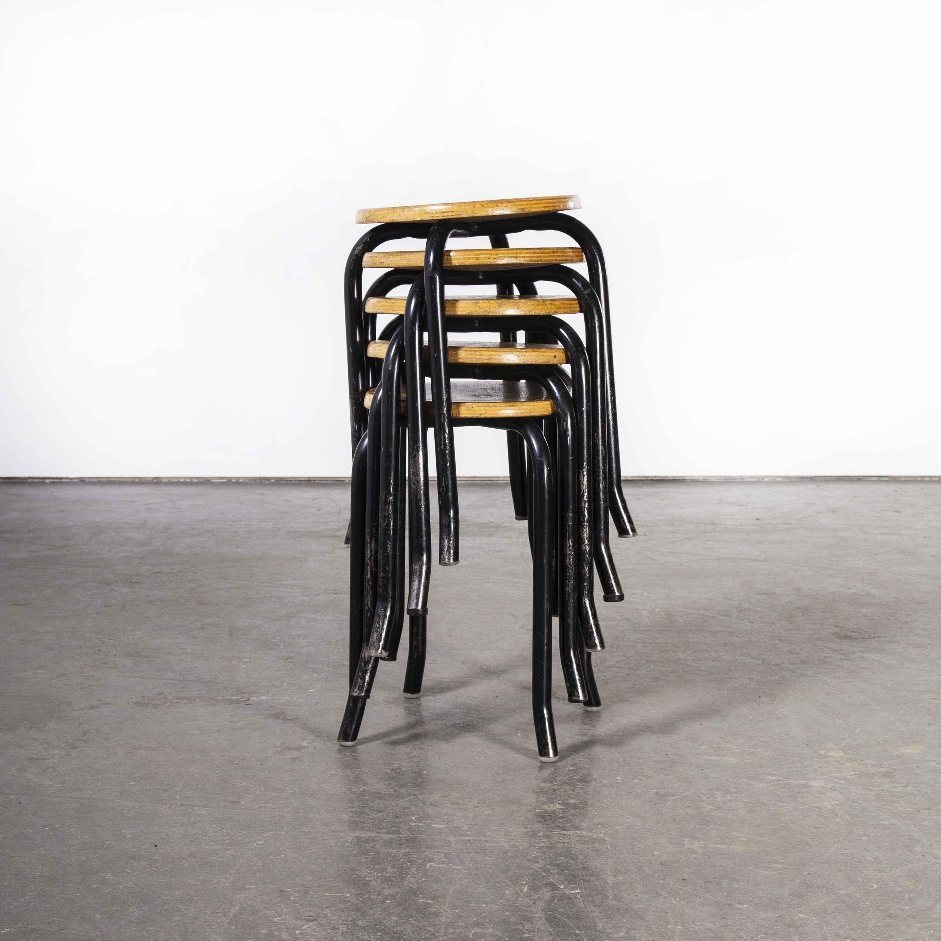 1960's Simple French Stacking School Stools, Black, Set of Five Kick Leg In Good Condition In Hook, Hampshire