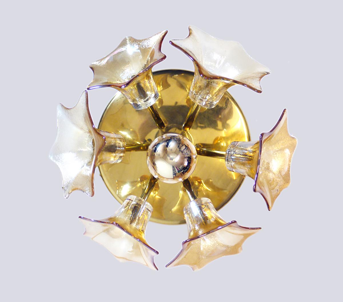 Elegant ceiling fixture or wall sconce with six iridescent amber Murano glass flowers on a golden brass frame. Gem from the time. A real eye-catcher even unlit. This light can be fitted to wall or ceiling. 

Designed and manufactured to Josef Simon