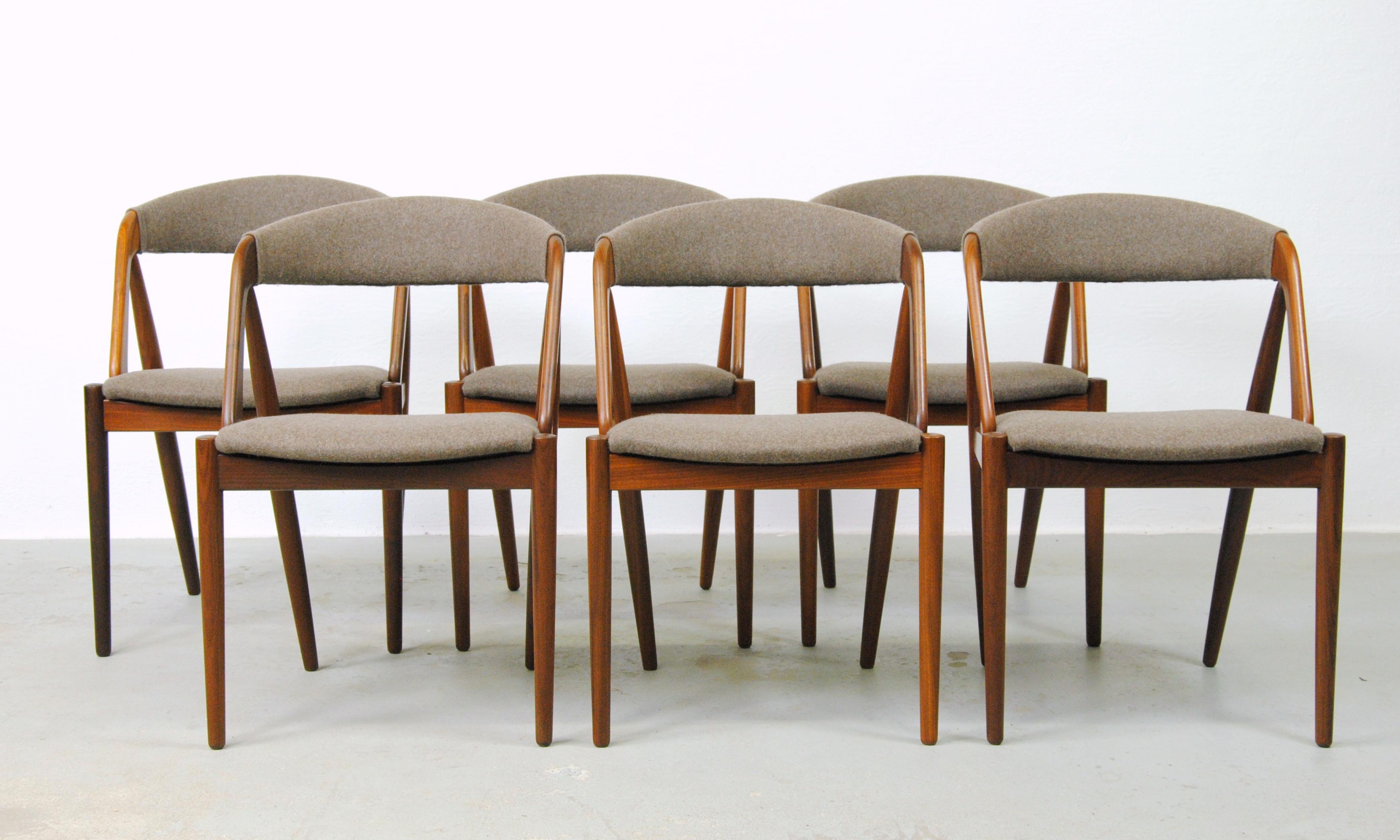 Kai Kristiansen set of six fully restored teak dining chairs by Schou Andersens Møbel Fabrik including custom upholstery.

The A-frame model 31 dining chairs were designed by Kai Kristiansen in 1956 for Schou-Andersens Møbelfabrik and the A-frame