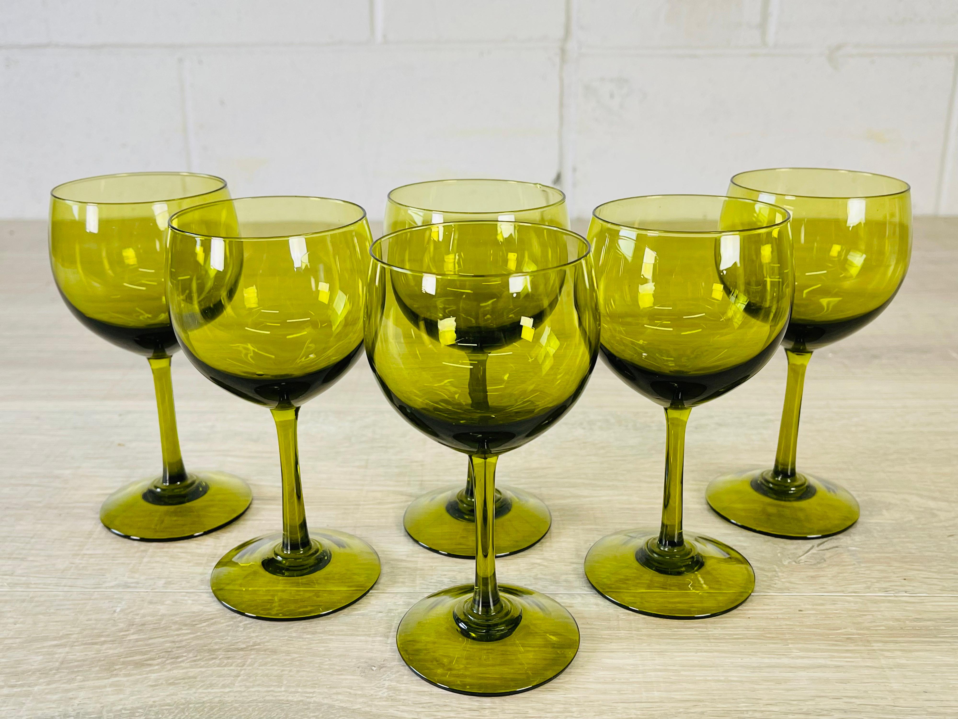 Vintage 1960s set of 6 smaller green glass wine stems. No marks.