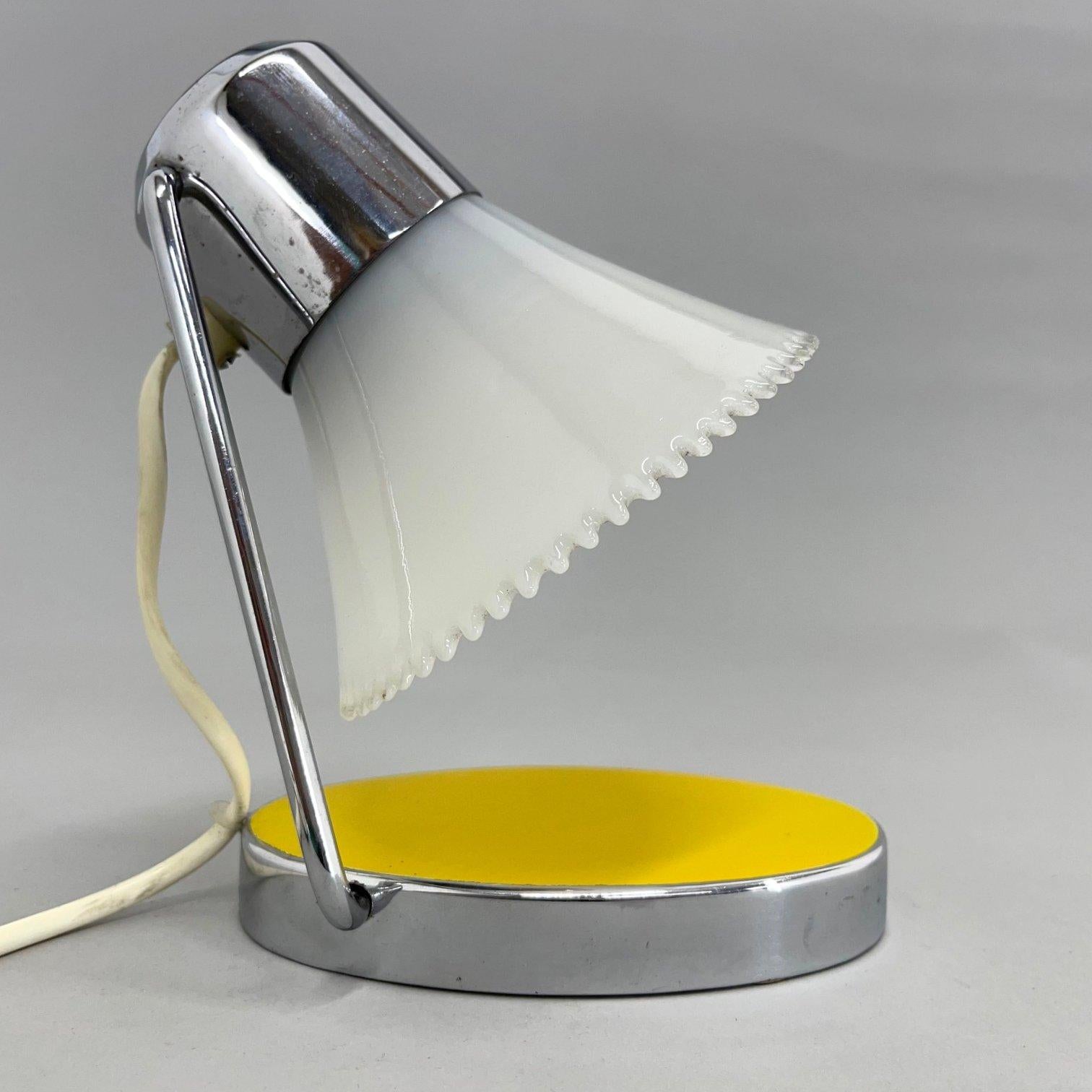 Small table lamp with adjustable shade from former Czechoslovakia.
Bulb: 1 x E25-E27.