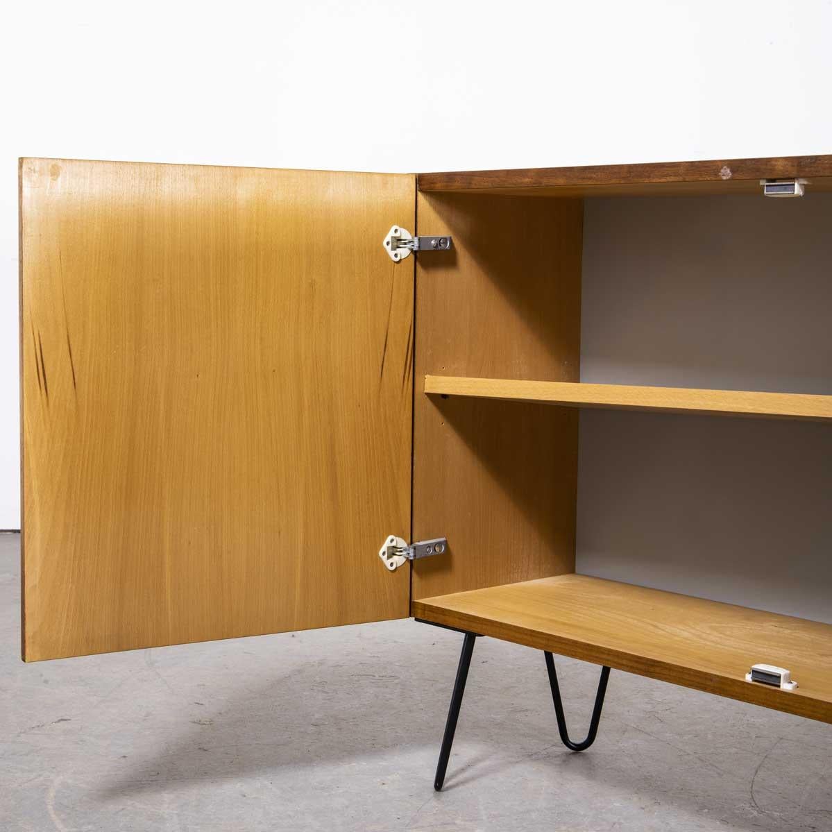 1960’s Small two door cabinet – cupboard
1960’s Small two door cabinet – cupboard. Good sized cabinet/cupboard produced by Up Navody in the Czech Republic. Made principally of matched and figured sapele with a contrasting beech interior. The two