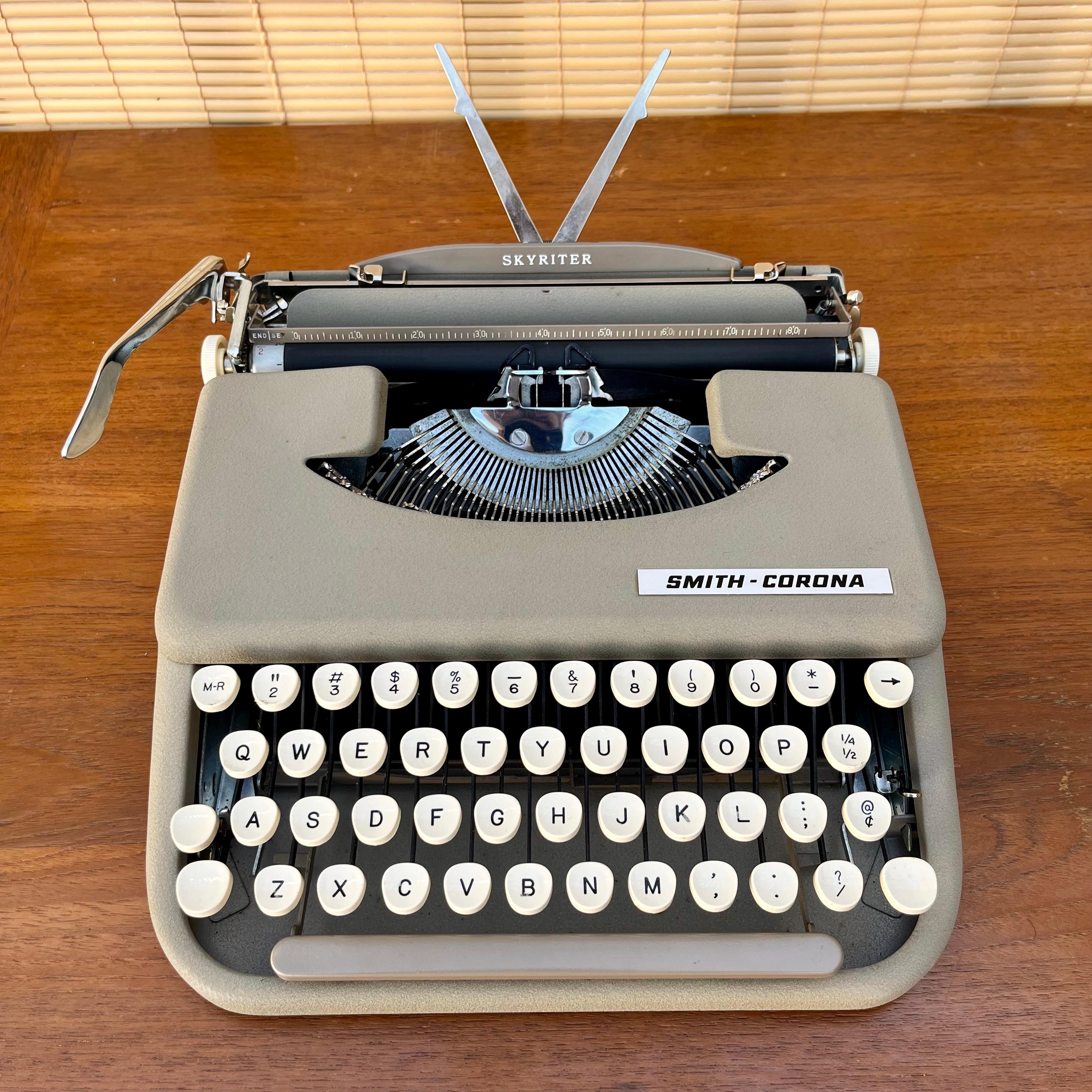 Mid-Century Modern 1960s Smith Corona Skyriter Portable Typewriter with Vinyl Case For Sale