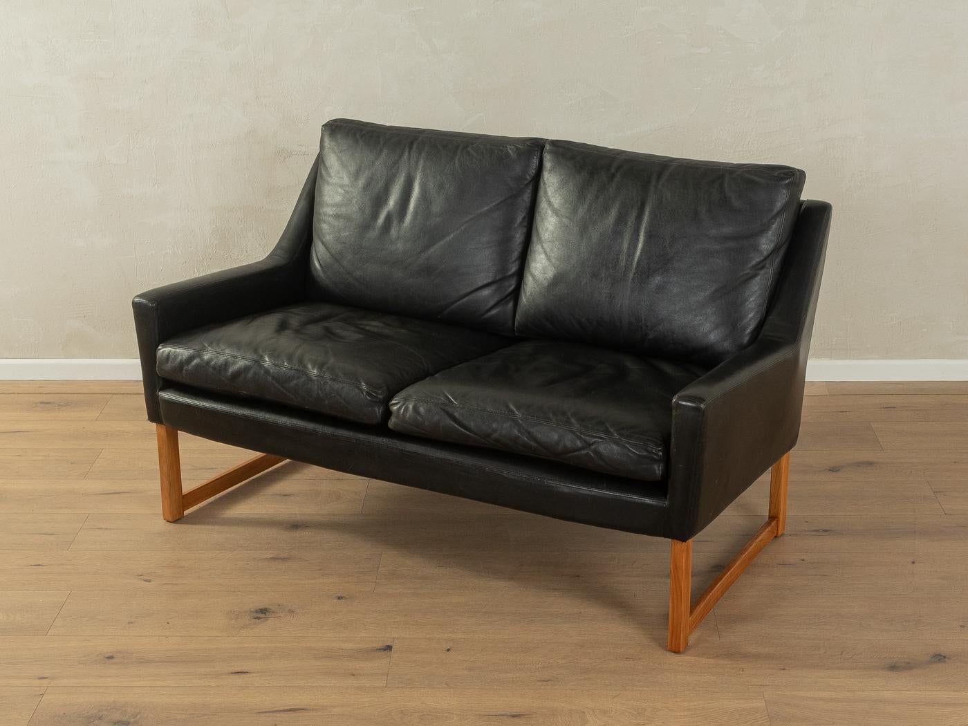Classic Sofa from the 1960s by Rudolf Bernd Glatzel for Kill International. High-quality solid cherrywood frame with original leather cover in black.

Quality Features:

    accomplished design: perfect proportions & visible attention to detail
   