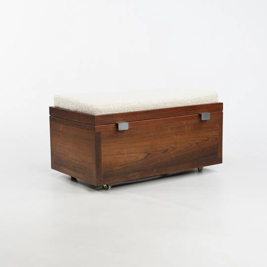 Listed for sale is a 1960s production sewing chest constructed from solid Brazilian rosewood and produced in Denmark. This is a gorgeous and rare piece, as Brazilian rosewood has always been a coveted and expensive material for furniture-making. The